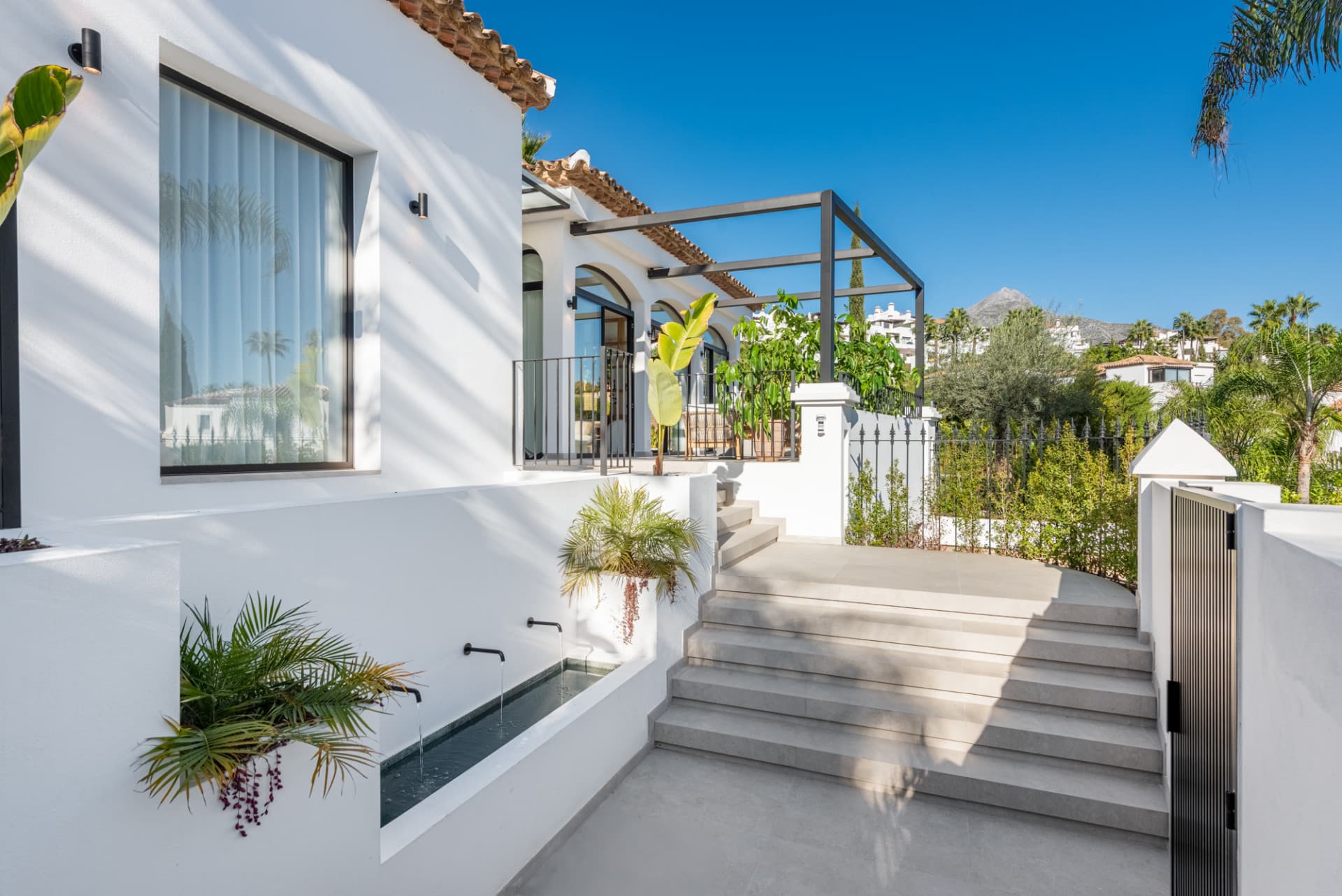 Top-renovated villa hidden inside a gated community in Nueva Andalucía.