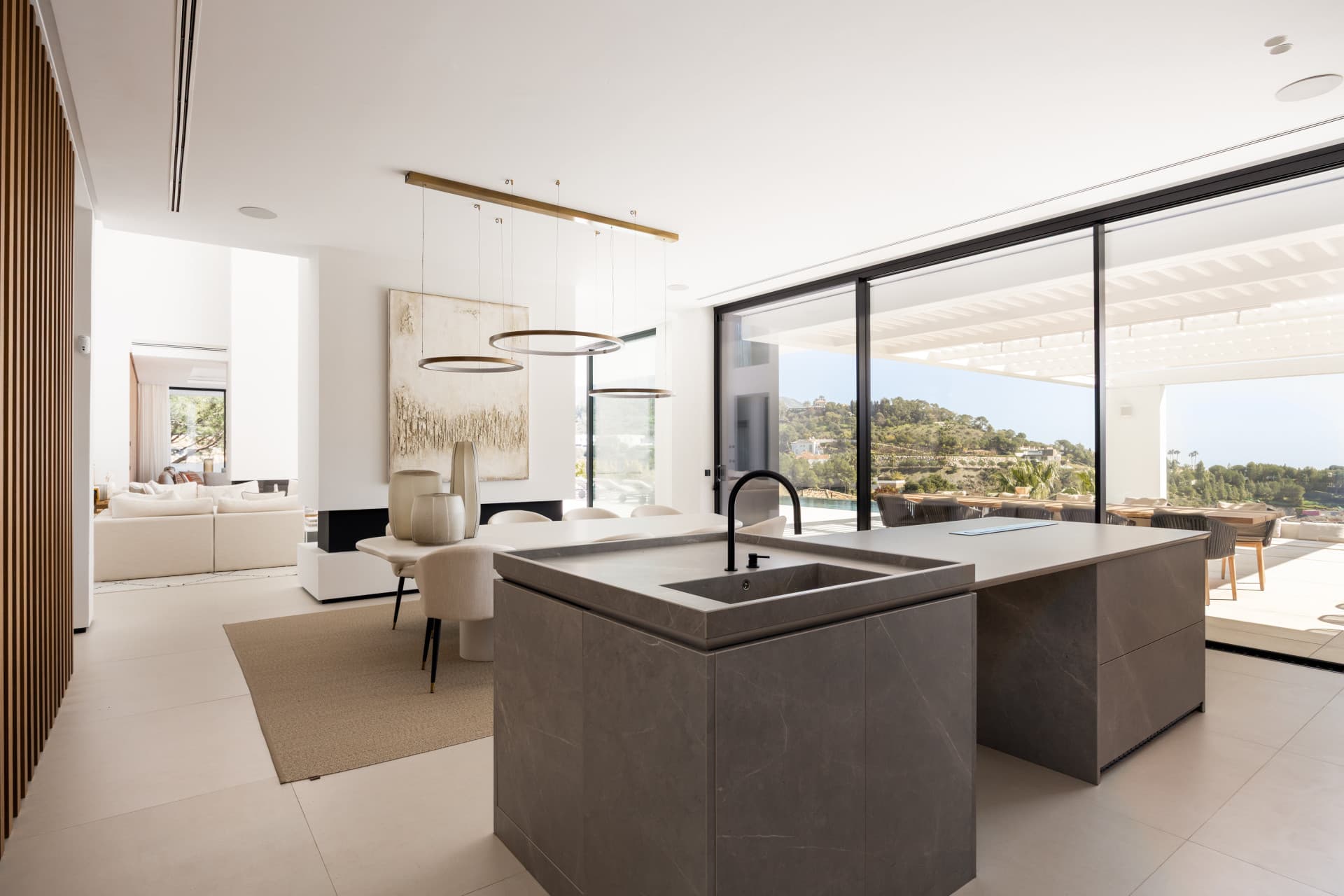 Casa De Canto is an exceptional seven-bedroom contemporary estate, in prestigious gated community of El Madroñal.