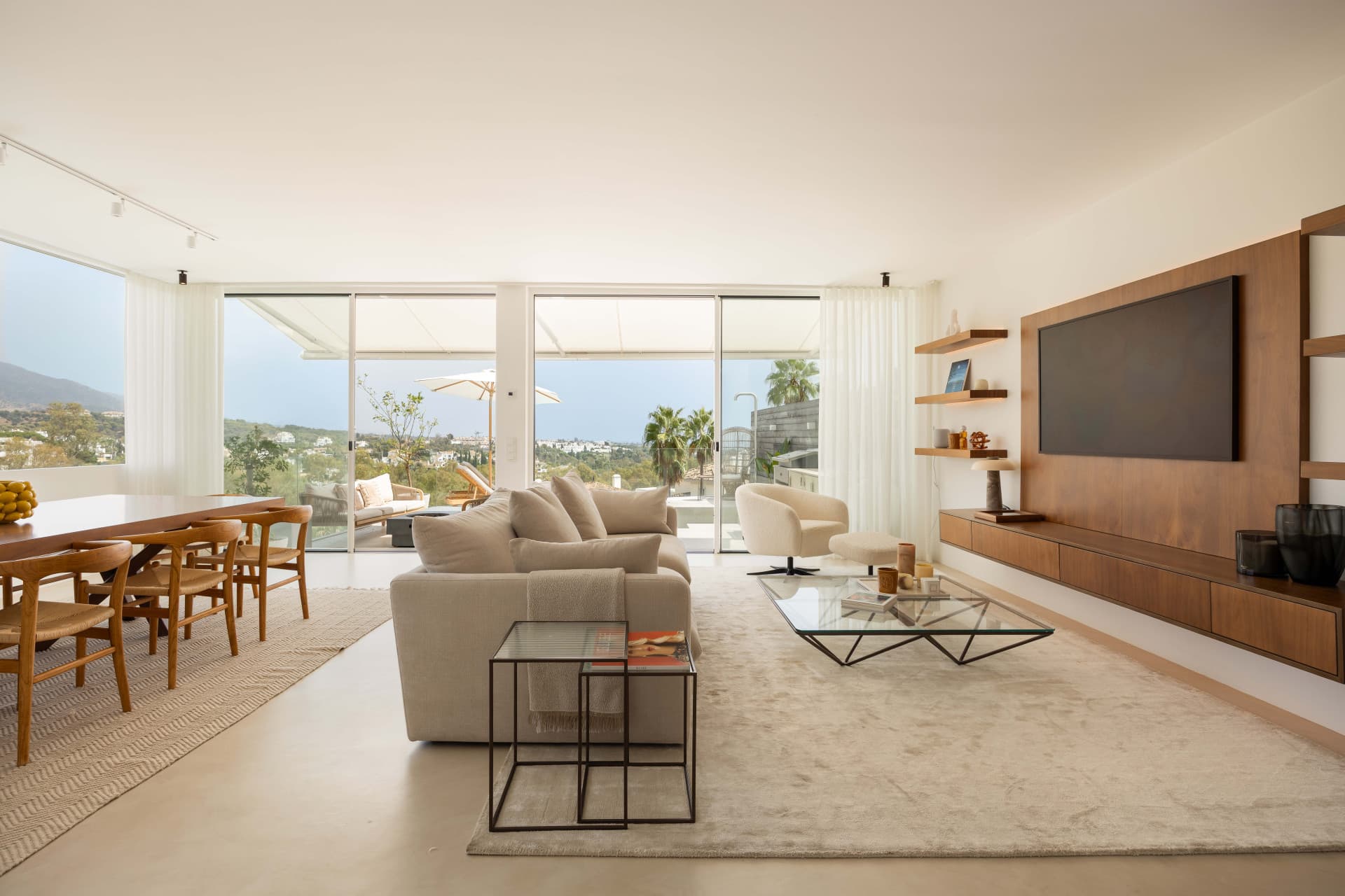 Panoramic sea, lake and La Concha views meet modern design, a private plunge pool and stylish outdoor living in Les Belvederes, Nueva Andalucia.