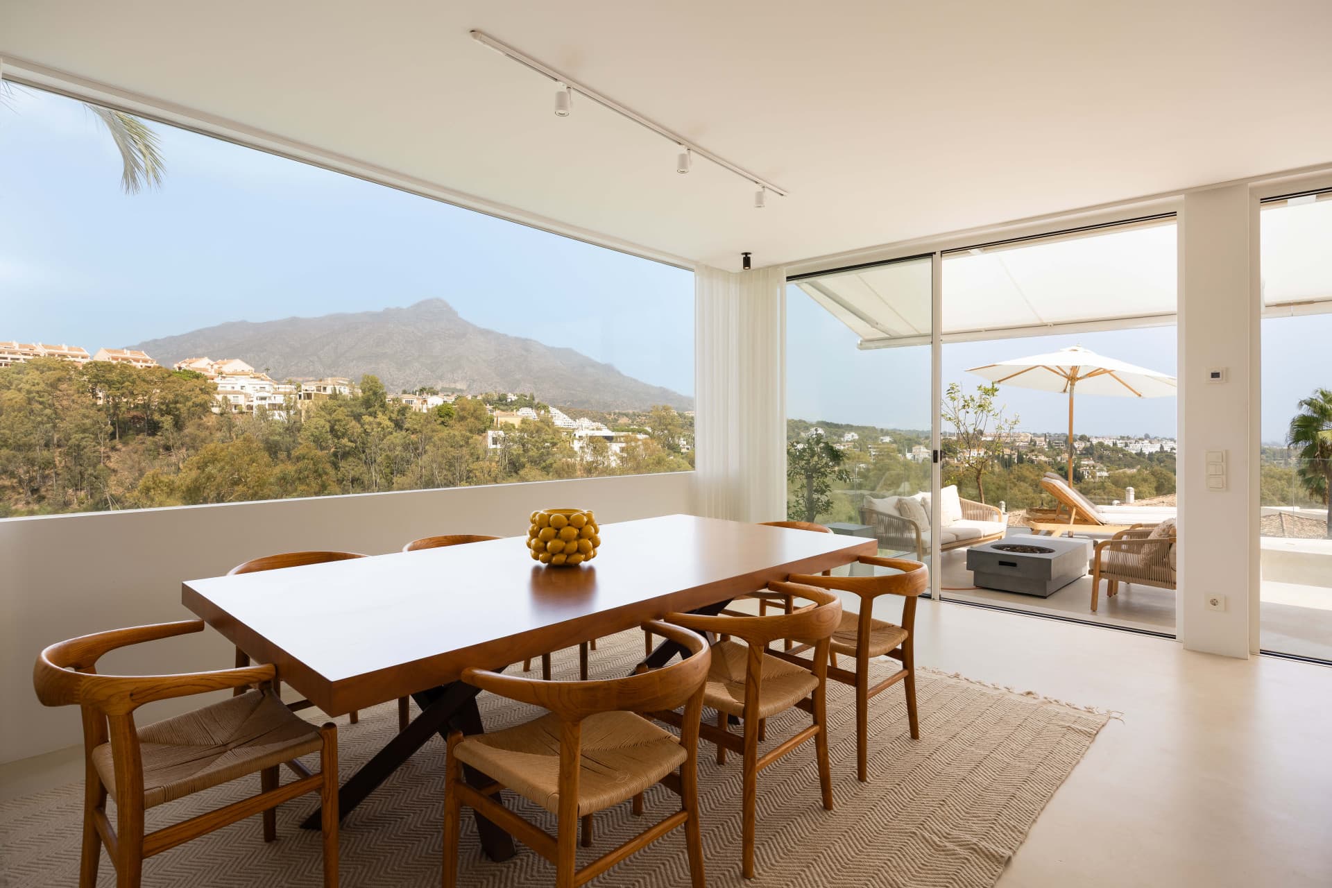 Panoramic sea, lake and La Concha views meet modern design, a private plunge pool and stylish outdoor living in Les Belvederes, Nueva Andalucia.