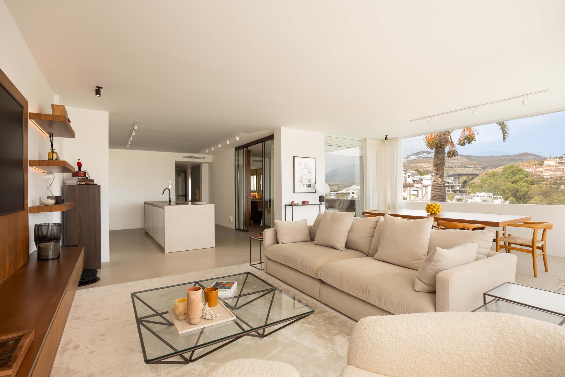 Panoramic sea, lake and La Concha views meet modern design, a private plunge pool and stylish outdoor living in Les Belvederes, Nueva Andalucia.