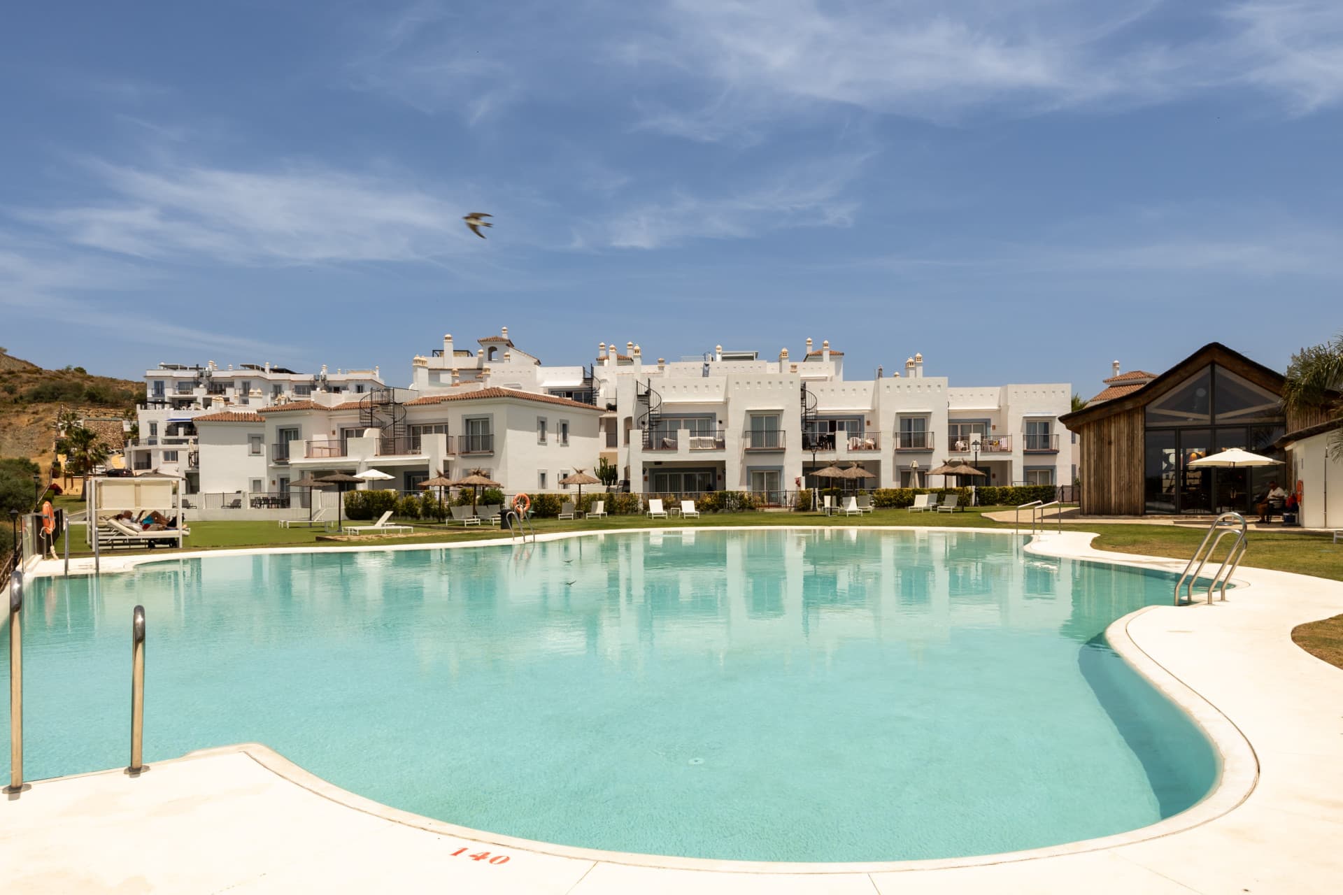 Stunning 2-bedroom penthouse in Paraiso Pueblo, Benahavís, offering panoramic sea views, a 100m² rooftop solarium, luxury resort-style amenities