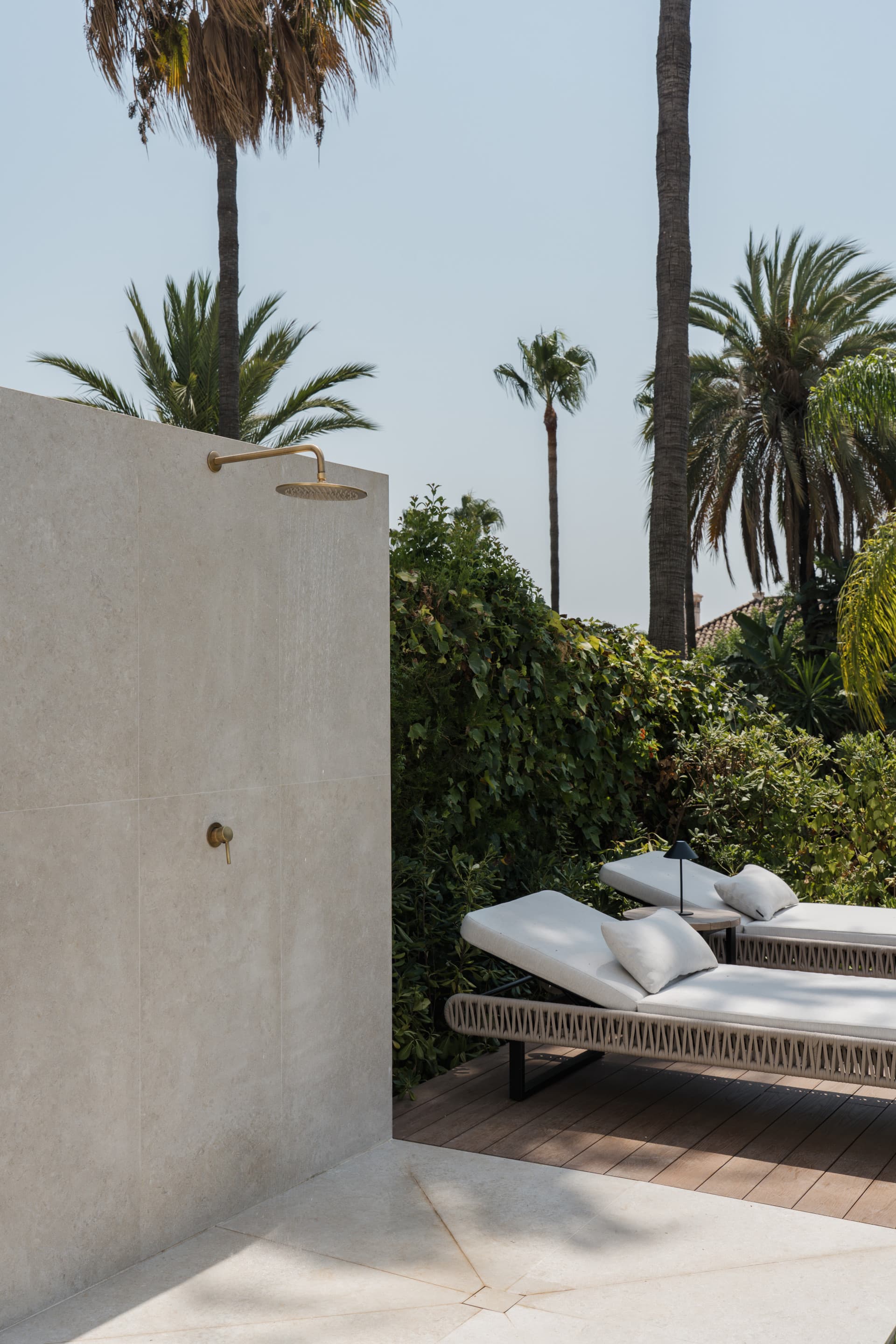 Located right beside Los Naranjos Golf Club, this fully renovated west-facing garden duplex is set within a double-gated