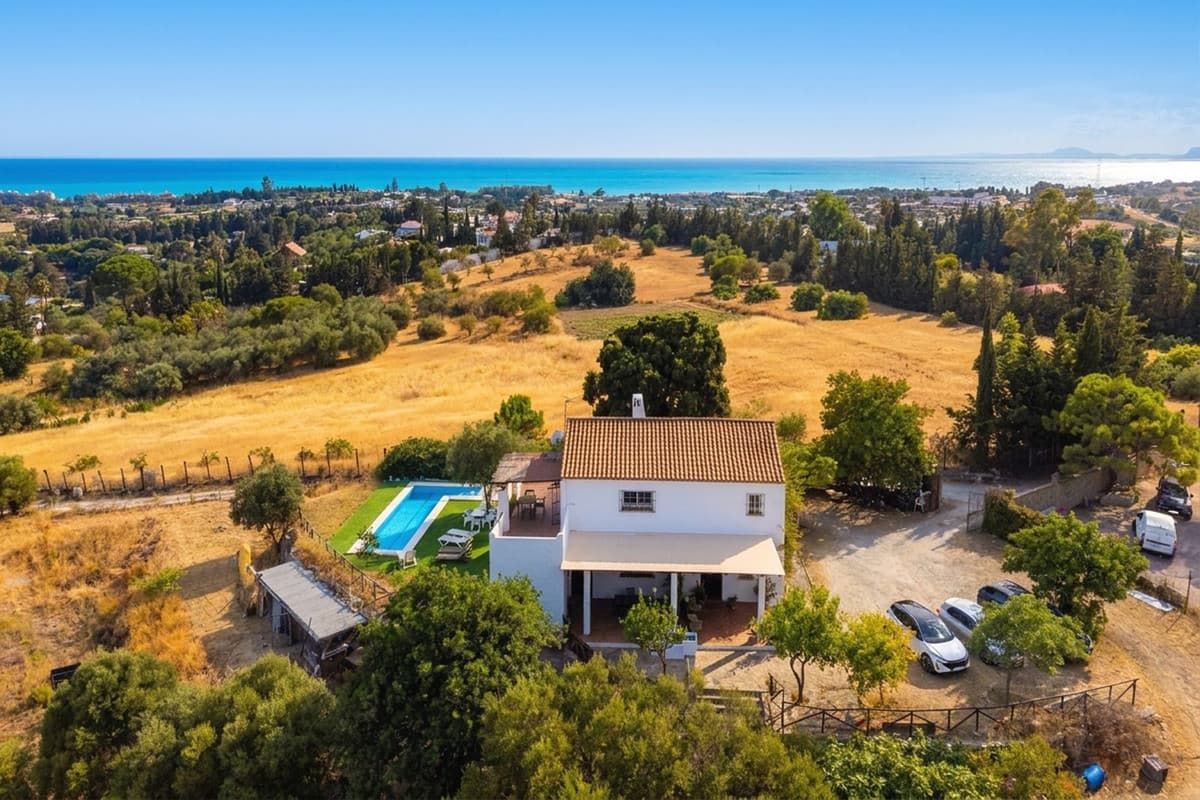 Charming country home for sale near Estepona, set on a large and very private plot with sea and mountain views