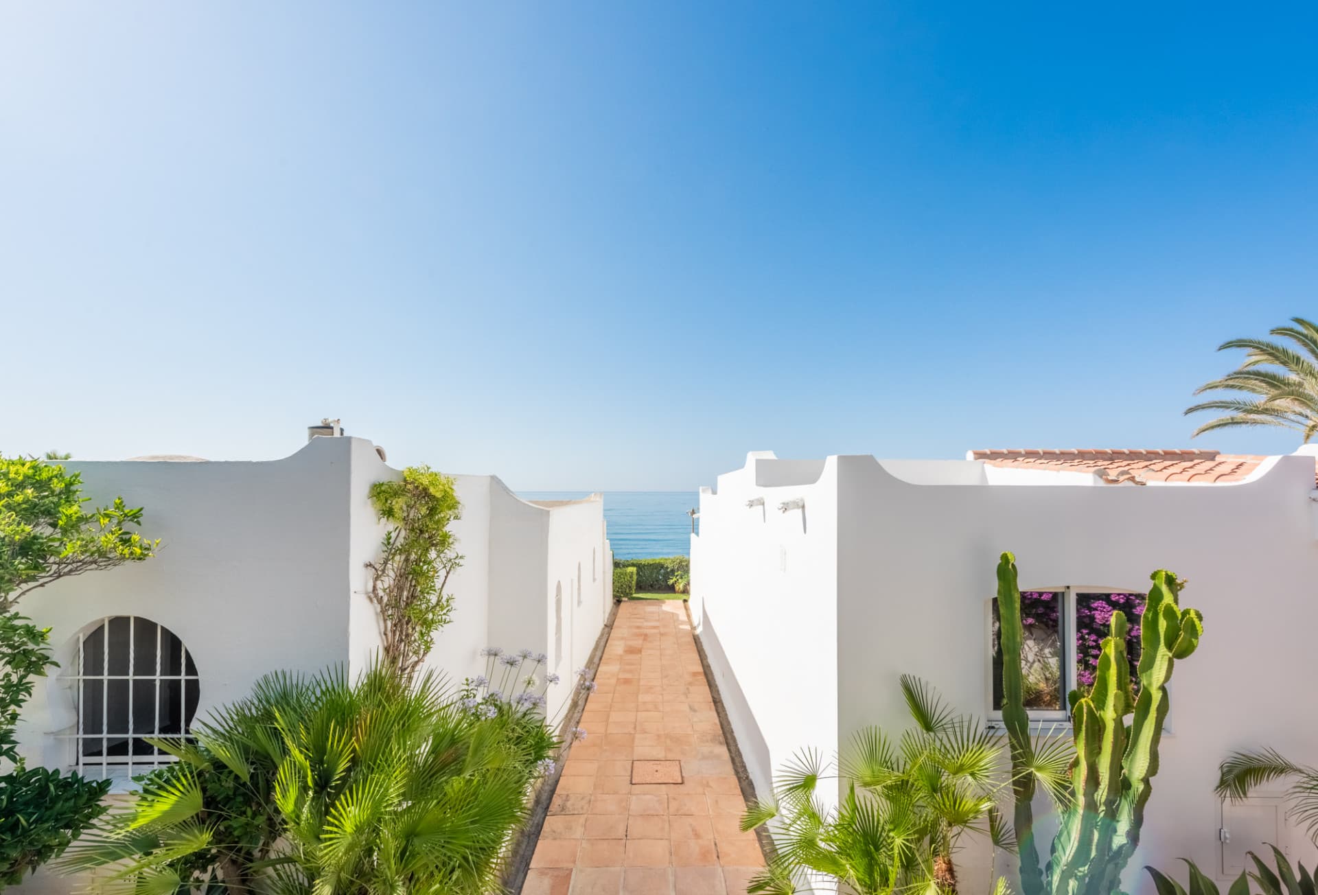 Scandi-style design bungalow in the beachfront Oasis Club on Marbella's Golden Mile.
