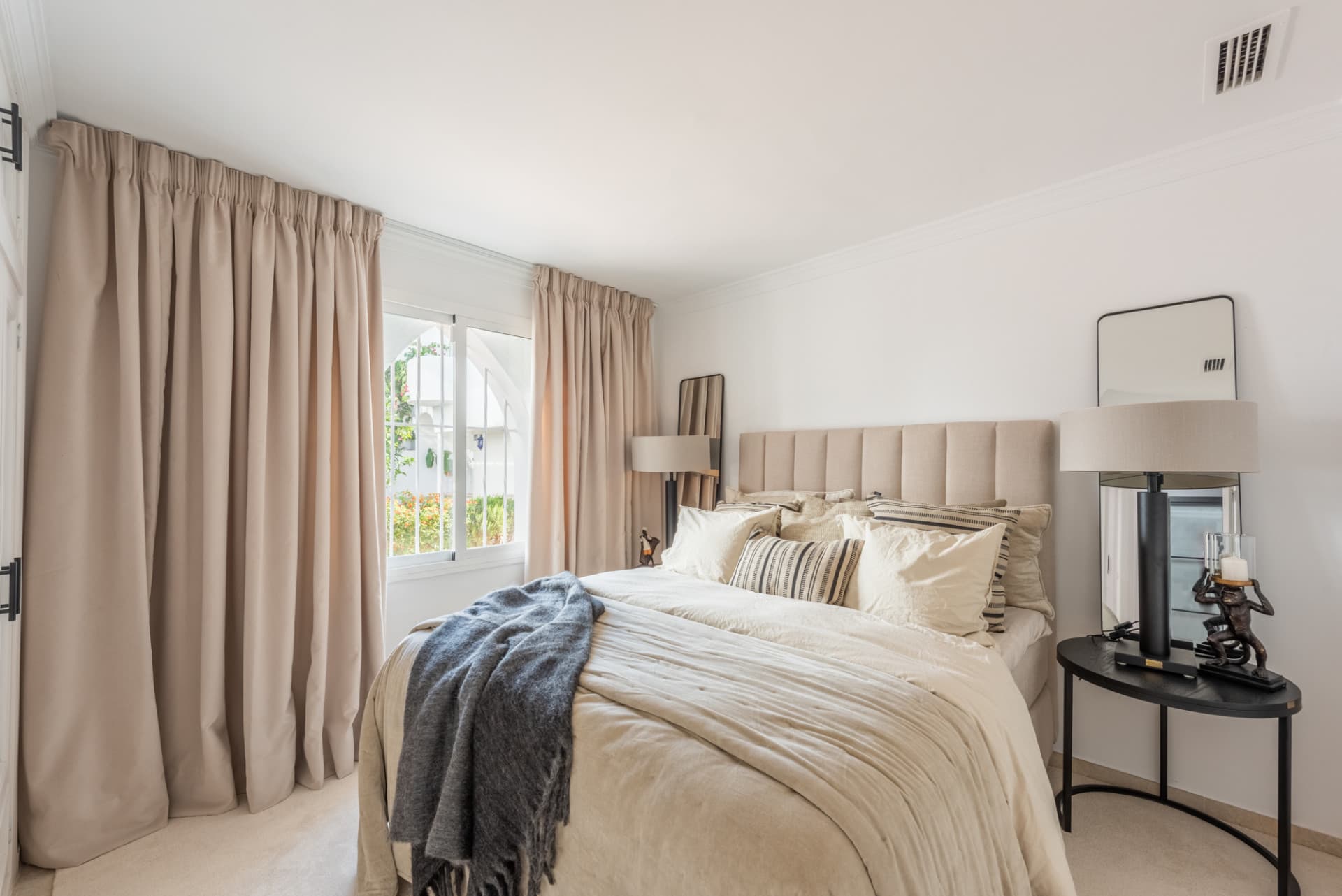 Scandi-style design bungalow in the beachfront Oasis Club on Marbella's Golden Mile.