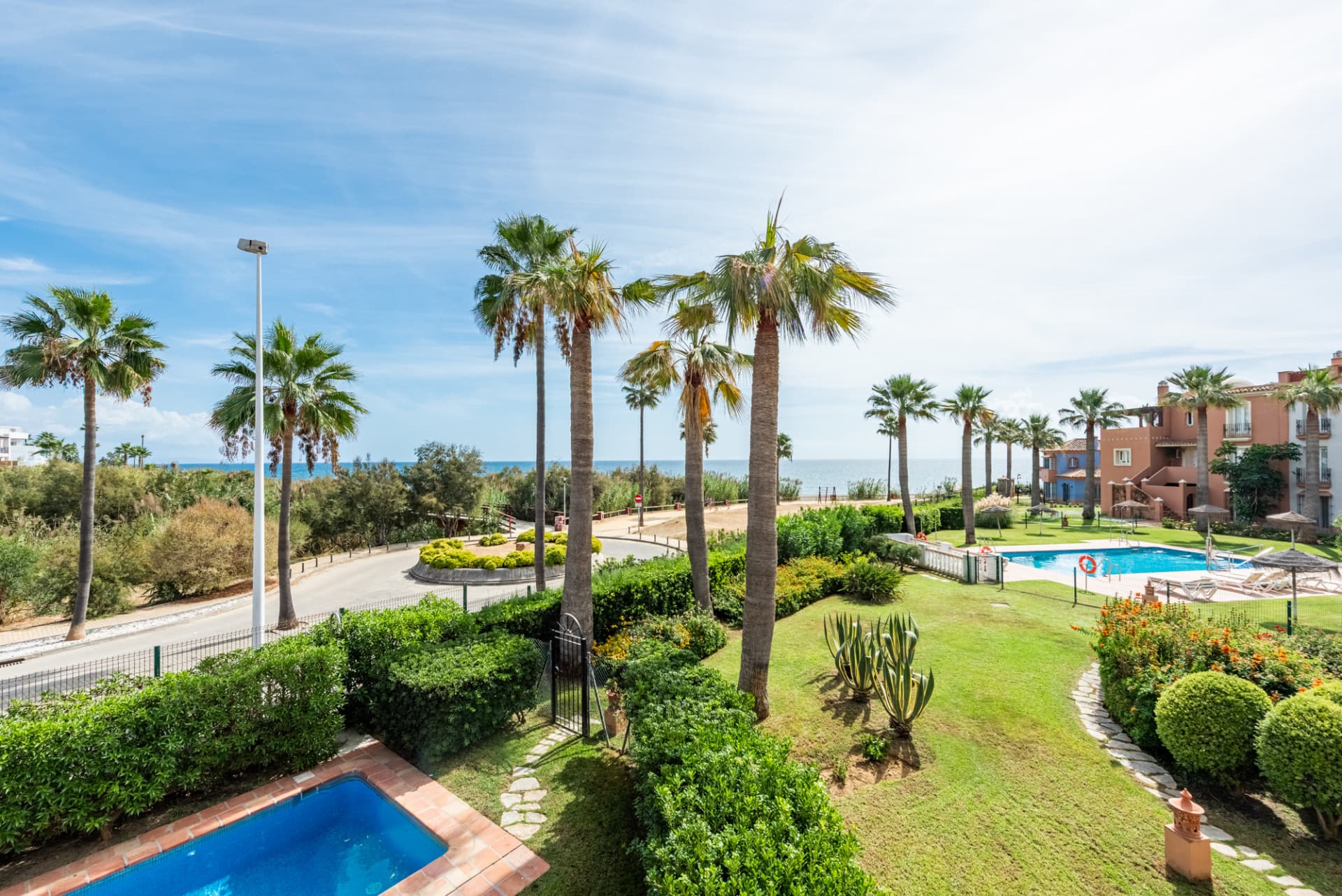 One of only three beachfront villas in La Perla de la Bahía!