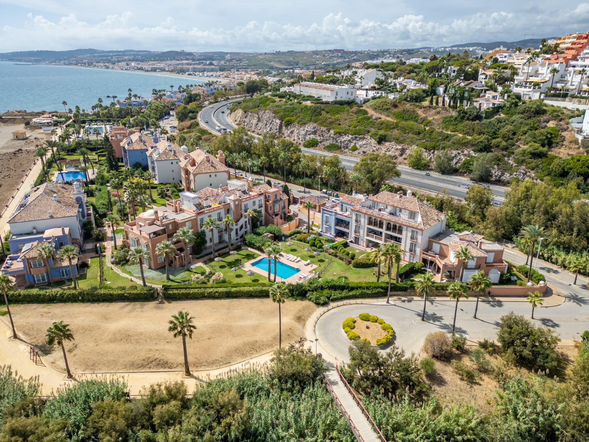 One of only three beachfront villas in La Perla de la Bahía!