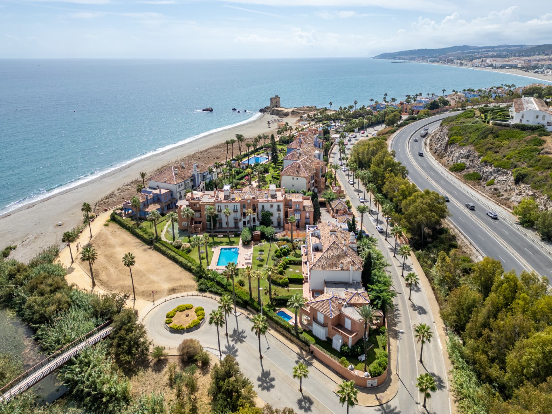 One of only three beachfront villas in La Perla de la Bahía!