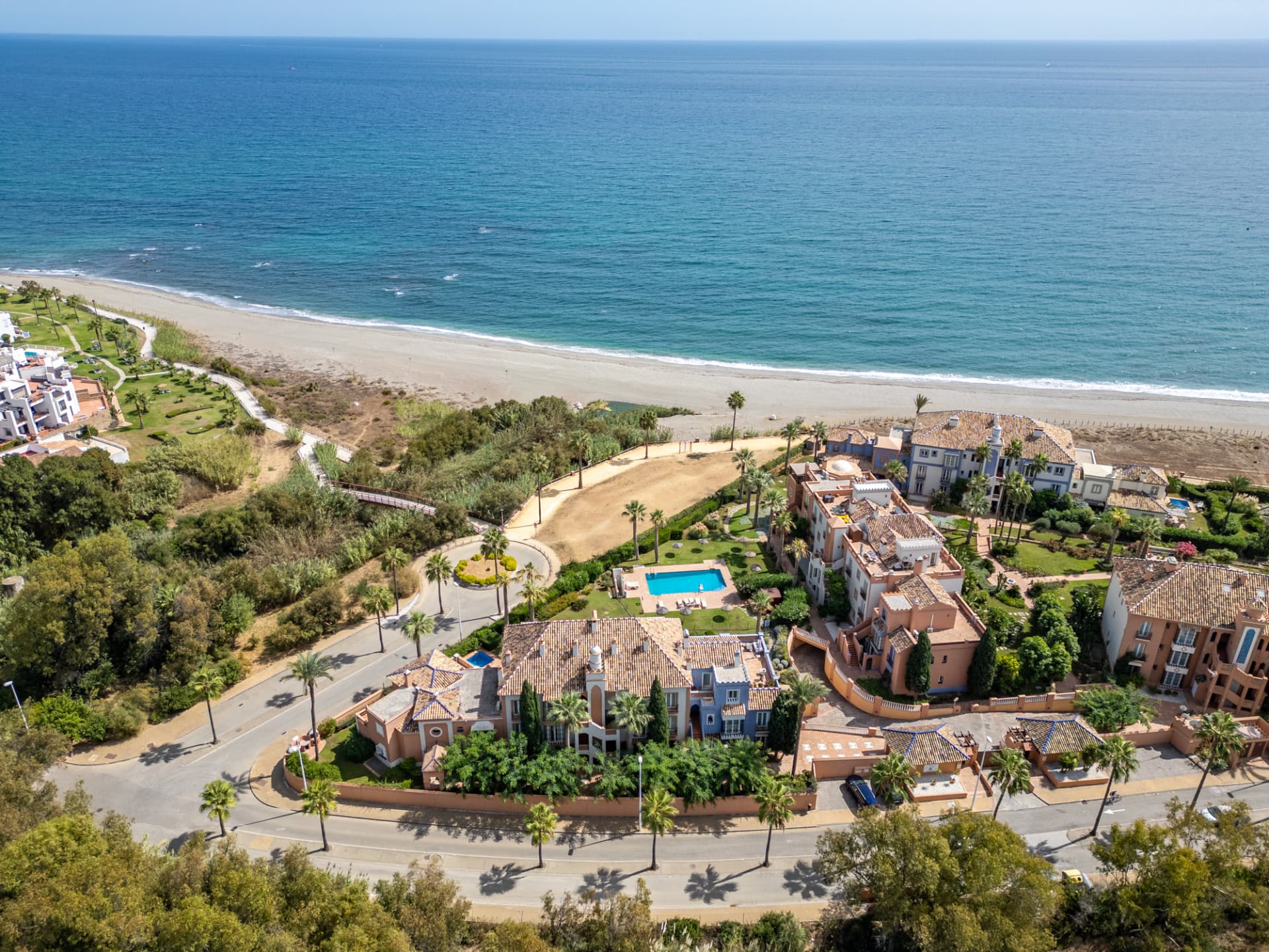 One of only three beachfront villas in La Perla de la Bahía!