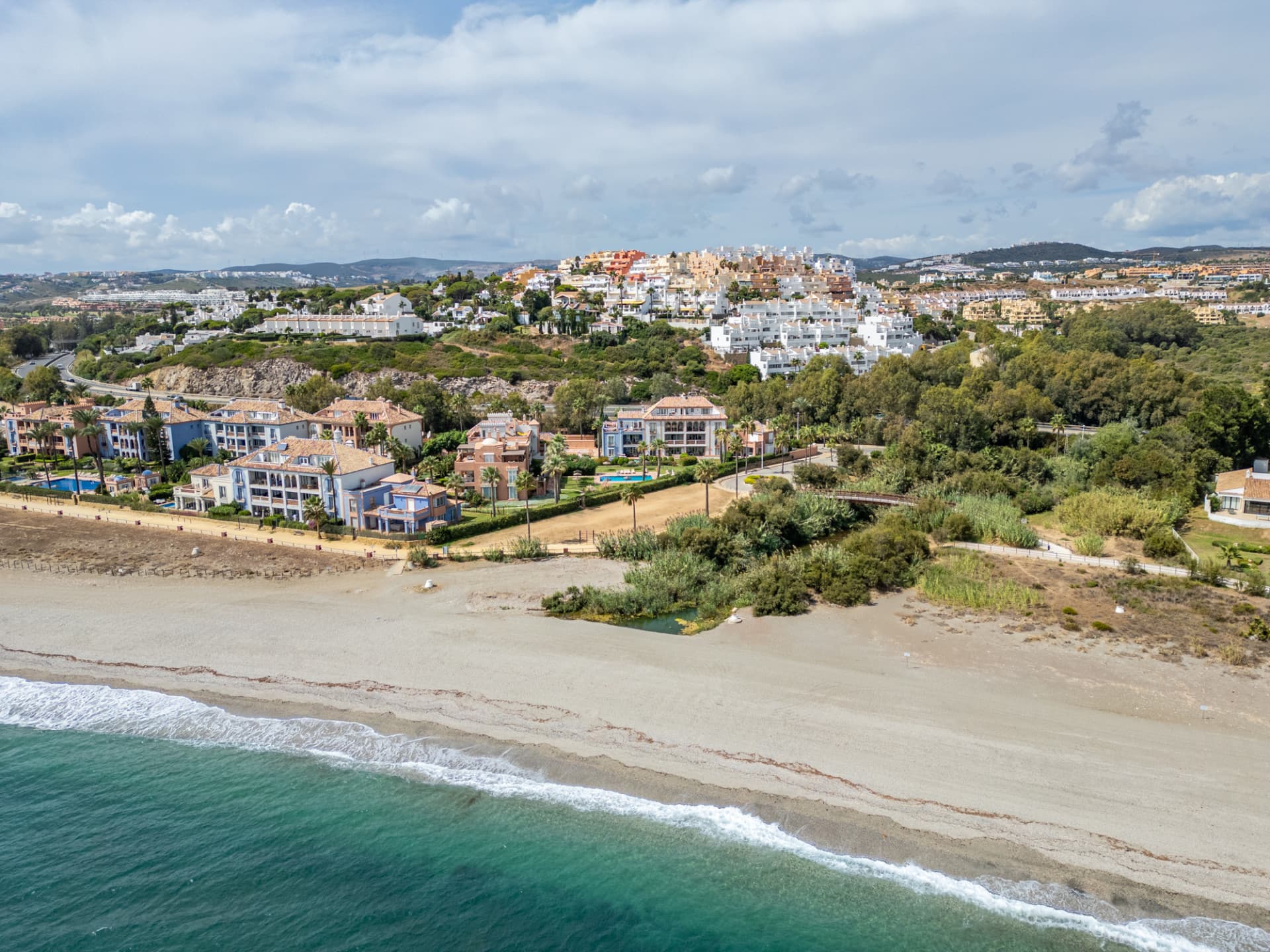 One of only three beachfront villas in La Perla de la Bahía!