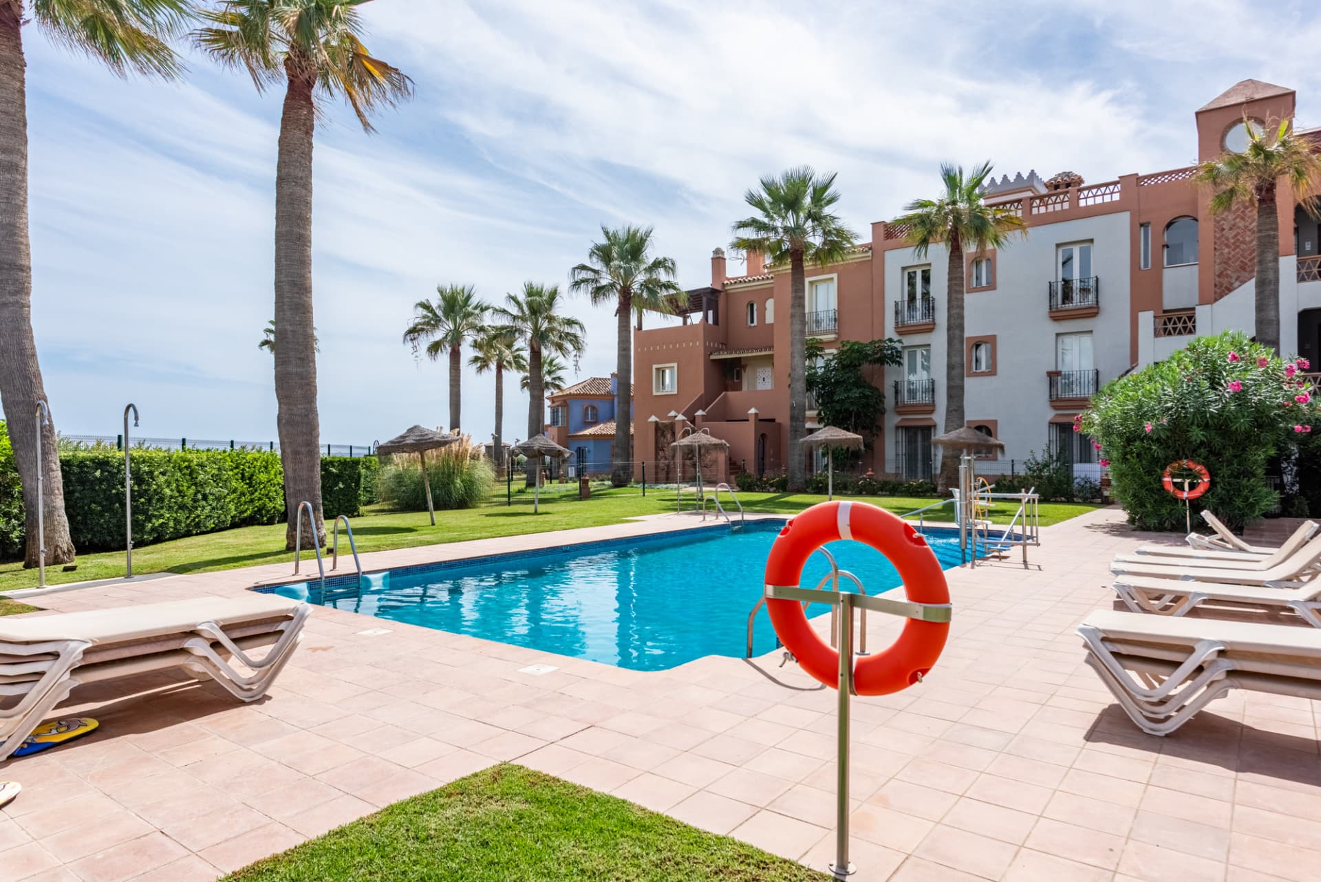 One of only three beachfront villas in La Perla de la Bahía!