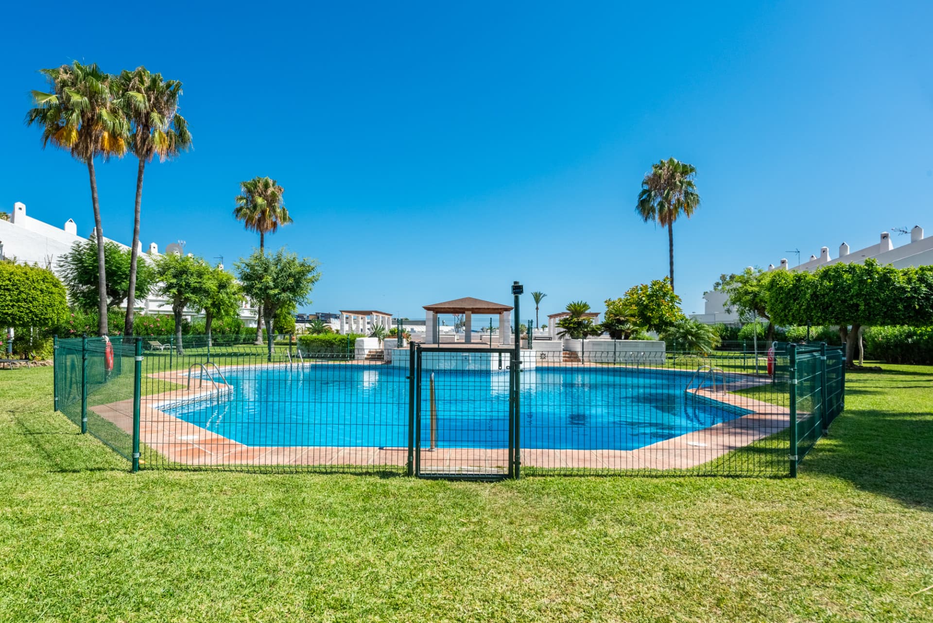 Corner Townhouse with Exceptional Private Garden on the New Golden Mile, Estepona