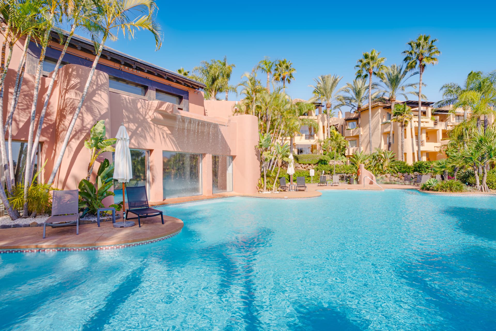 Beautiful, two bedroom, south facing ground floor apartment in the prestigious Mansion Club Marbella