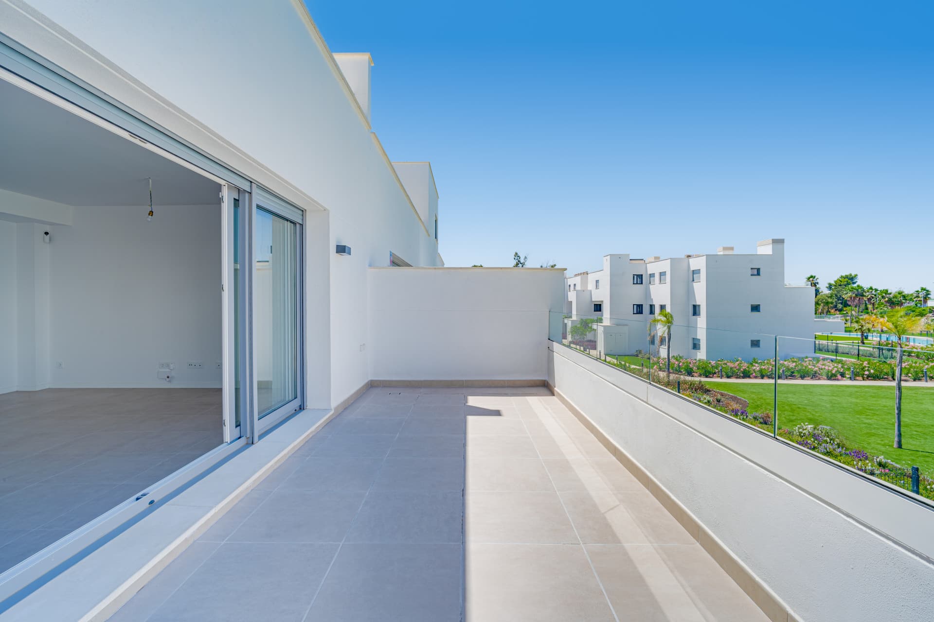 Brand new southwest facing two bedroom apartment located in the sought-after gated community Acqua Gardens, Estepona
