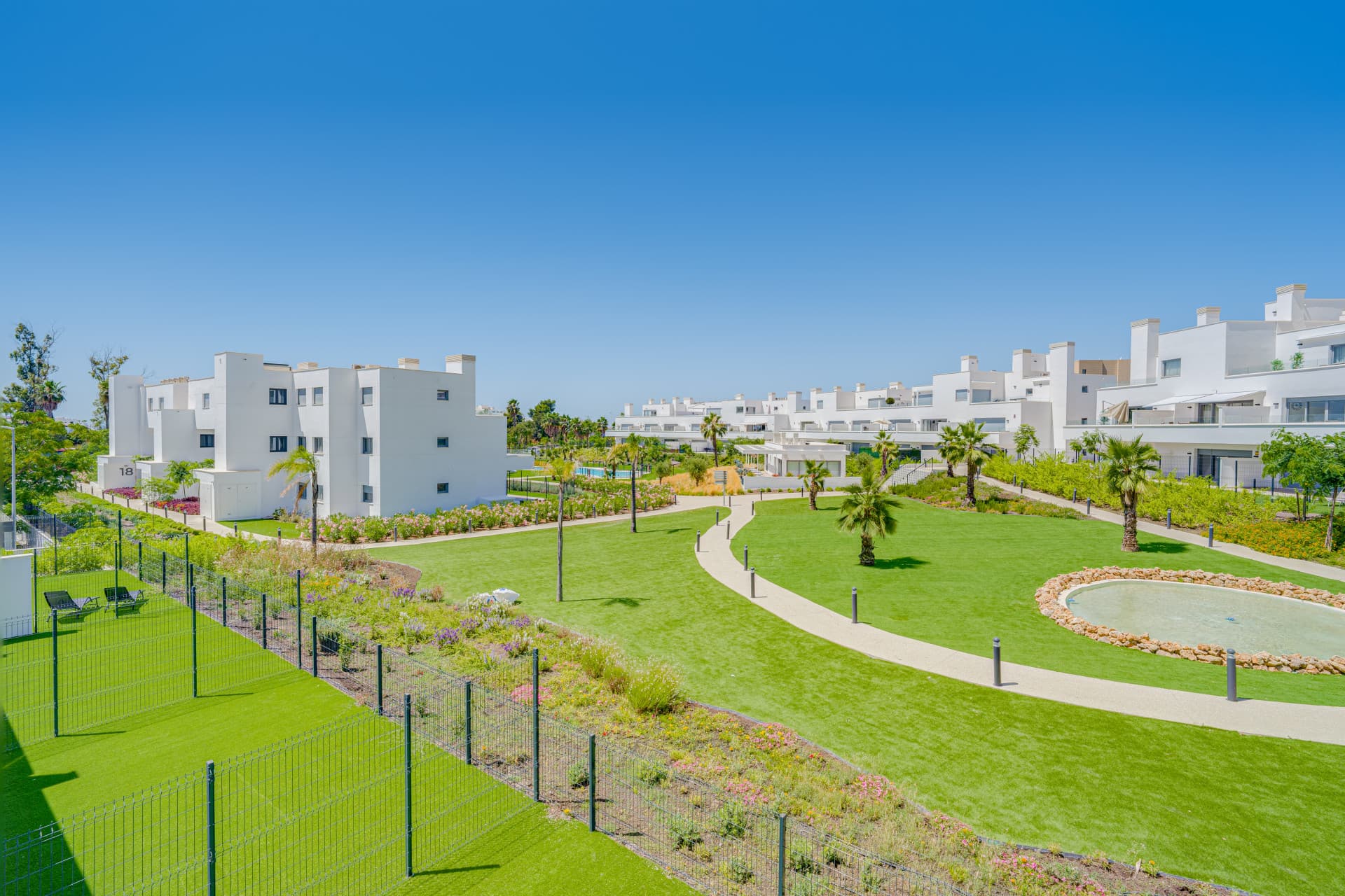 Brand new southwest facing two bedroom apartment located in the sought-after gated community Acqua Gardens, Estepona