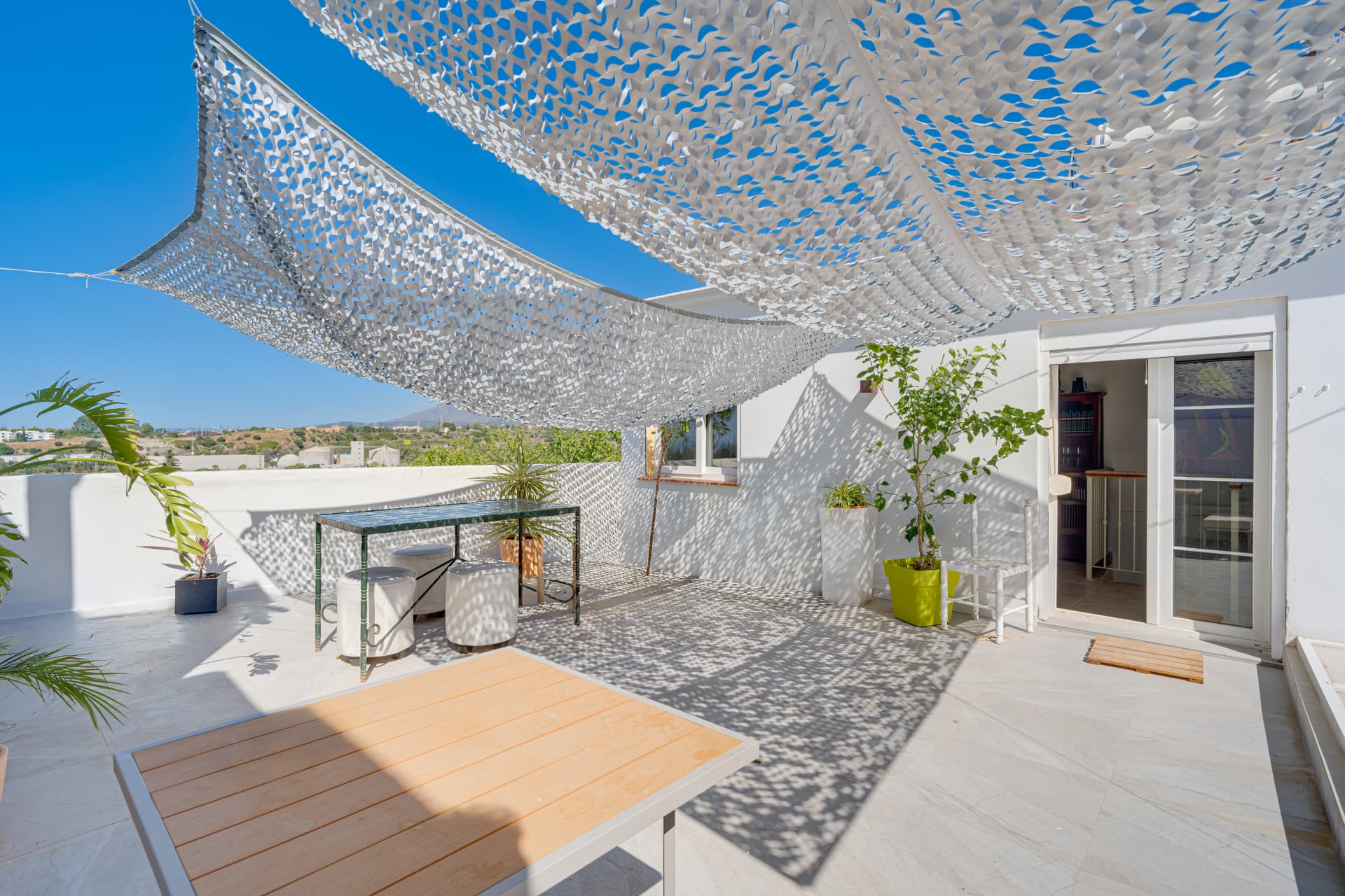 Unique five bedroom townhouse with rooftop terrace & excellent rental potential in Cancelada, Estepona