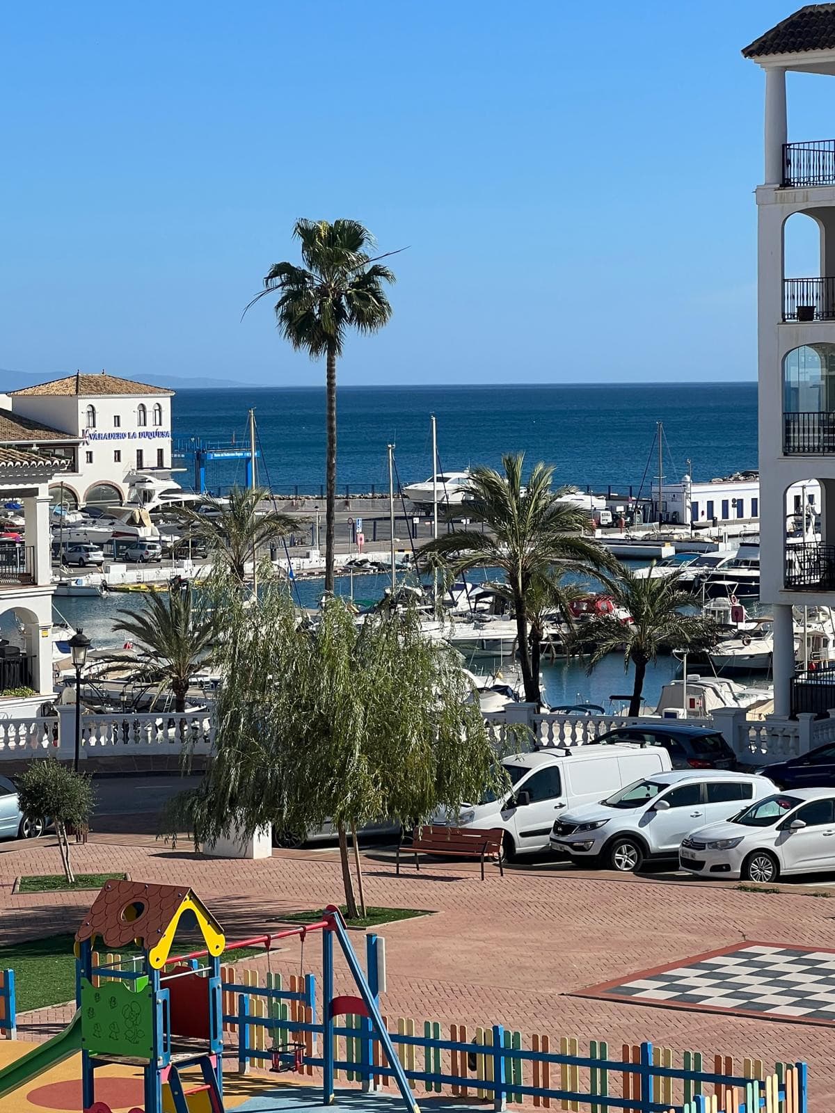 semi detached house in Puerto La Duquesa with a sun terrace, sea views and a private garage for just €375,000