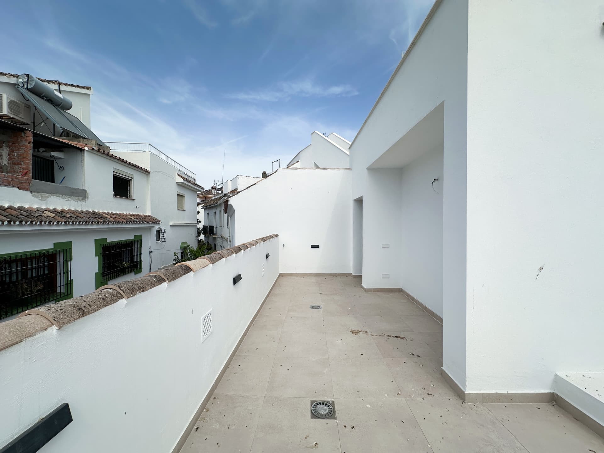 New Andalusian 2-Bedroom Townhouse with spacious Terrace for Sale in Estepona Old Town