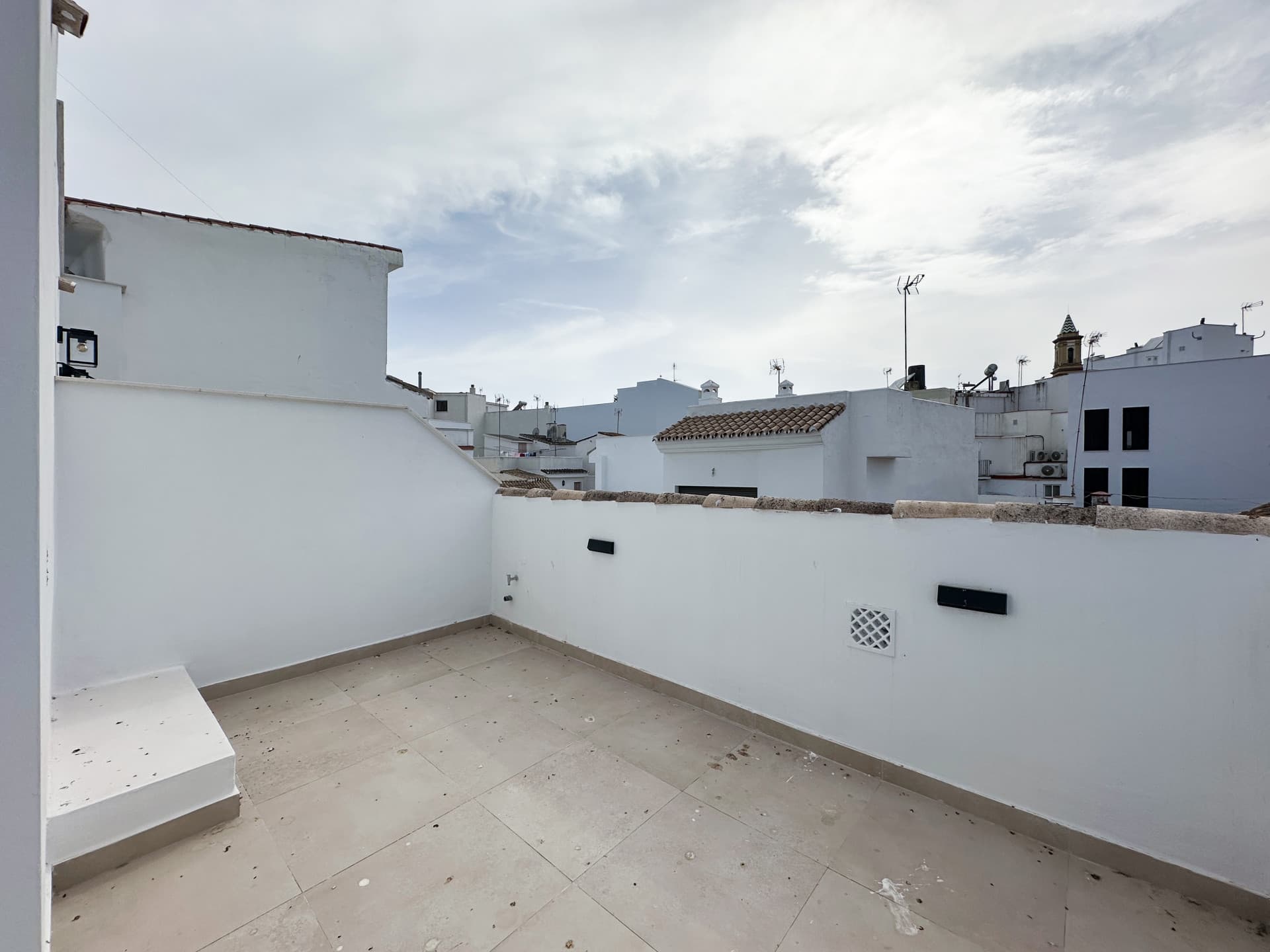 New Andalusian 2-Bedroom Townhouse with spacious Terrace for Sale in Estepona Old Town