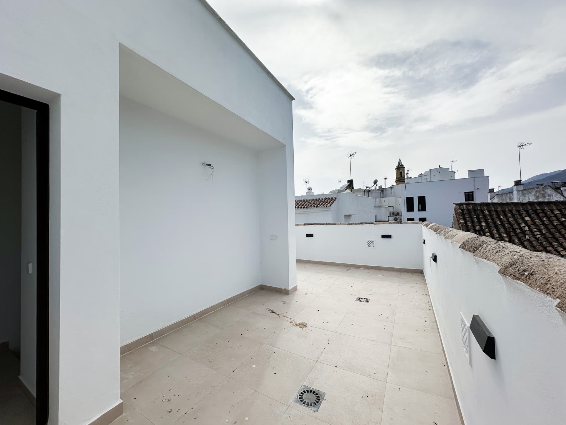 New Andalusian 2-Bedroom Townhouse with spacious Terrace for Sale in Estepona Old Town