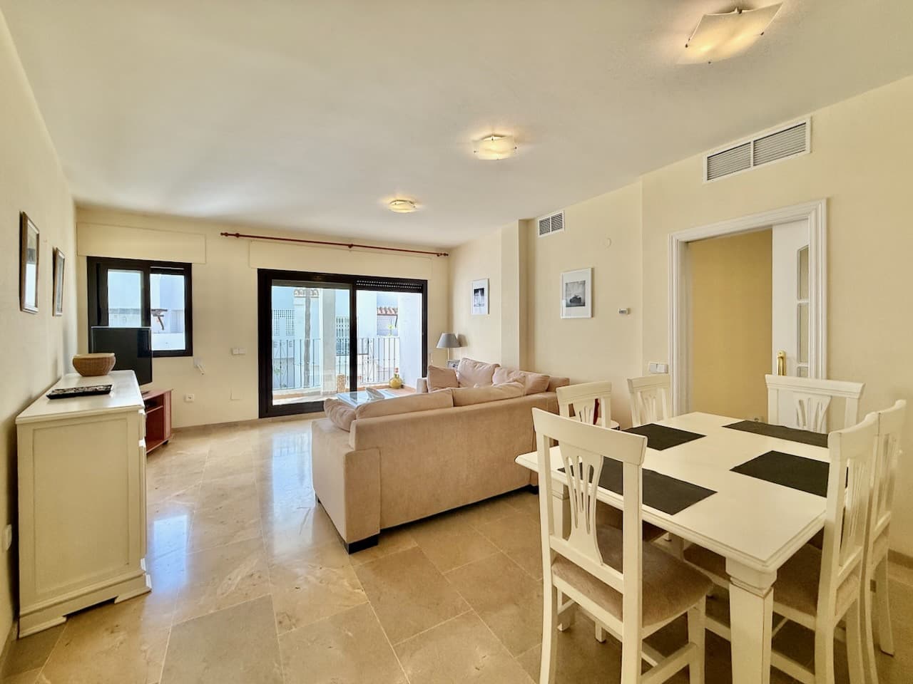 Spacious apartment with views over Duquesa Golf, close to the marina, Manilva