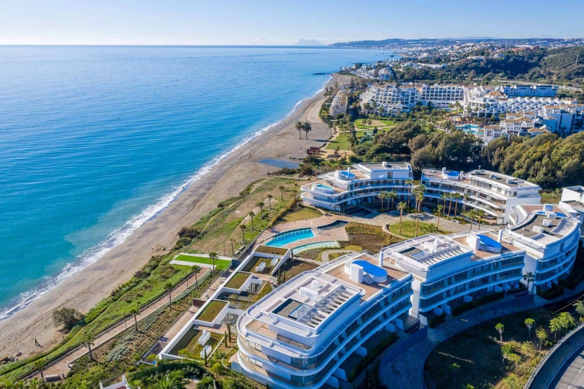 Luxurious beachfront apartment with private garden
