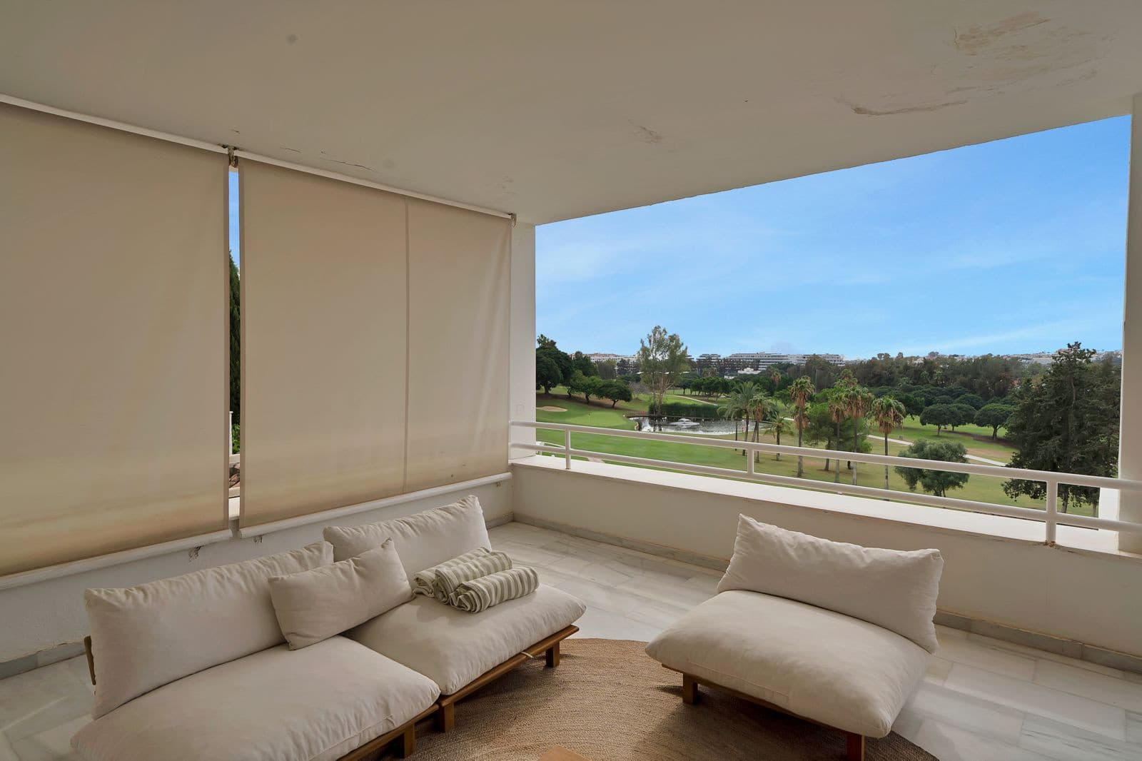 Recently renovated, west-facing middle-floor apartment within the exclusive gated community