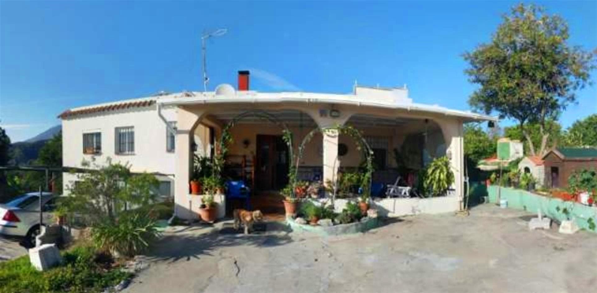 Good value rustic house with a big plot