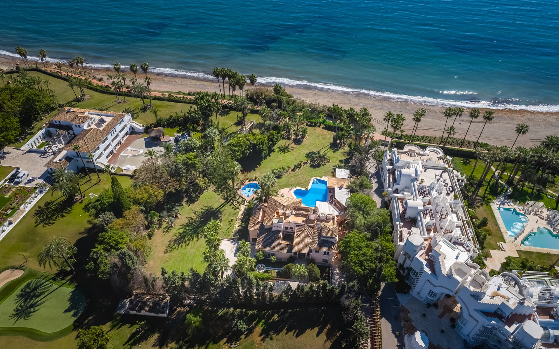 Nestled along the pristine shoreline of the New Golden Mile, this stunning frontline beach villa epitomises luxury livin