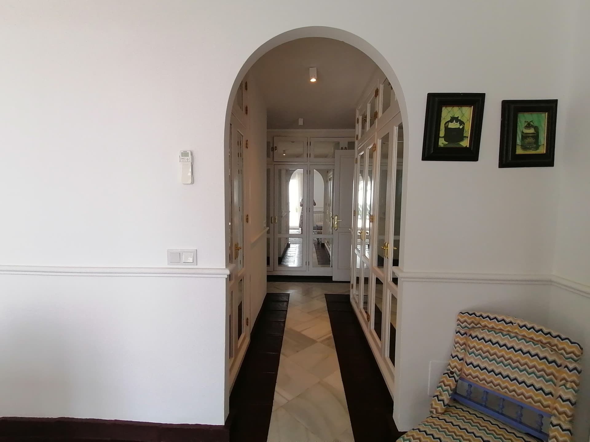 A spectacular and majestic beachfront property set on a large plot in the sought-after area of Guadalmina Baja
