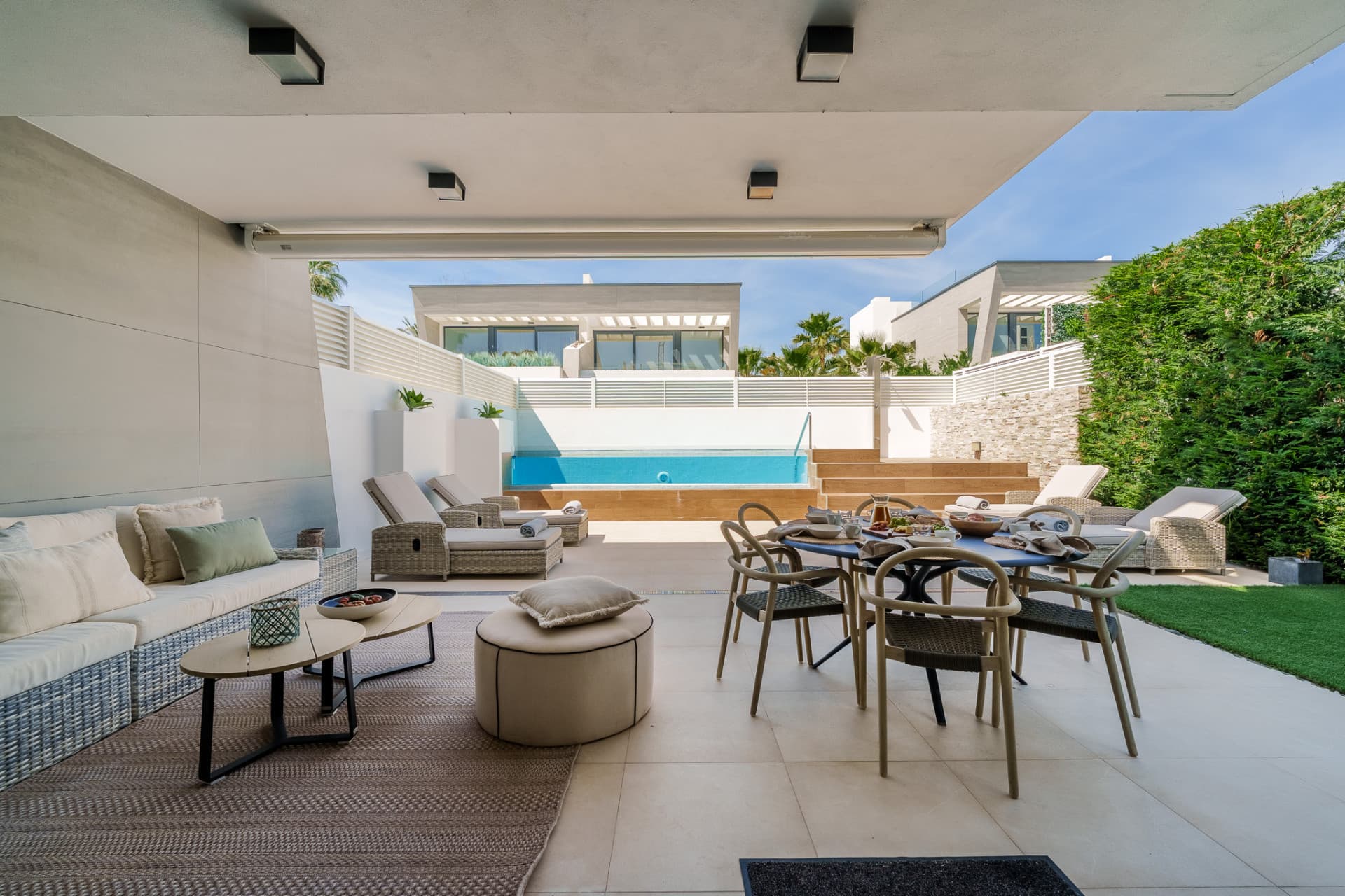 Contemporary Elegance by the Sea in Bahía de Banús This sophisticated, contemporary semi-detached villa is located in Ba