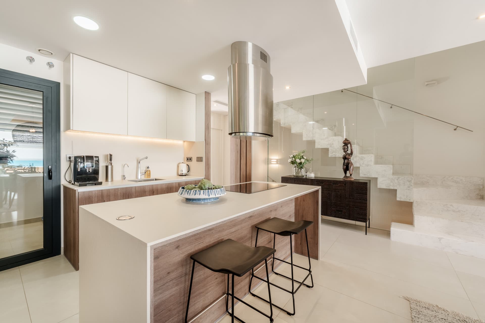 Contemporary Elegance by the Sea in Bahía de Banús This sophisticated, contemporary semi-detached villa is located in Ba