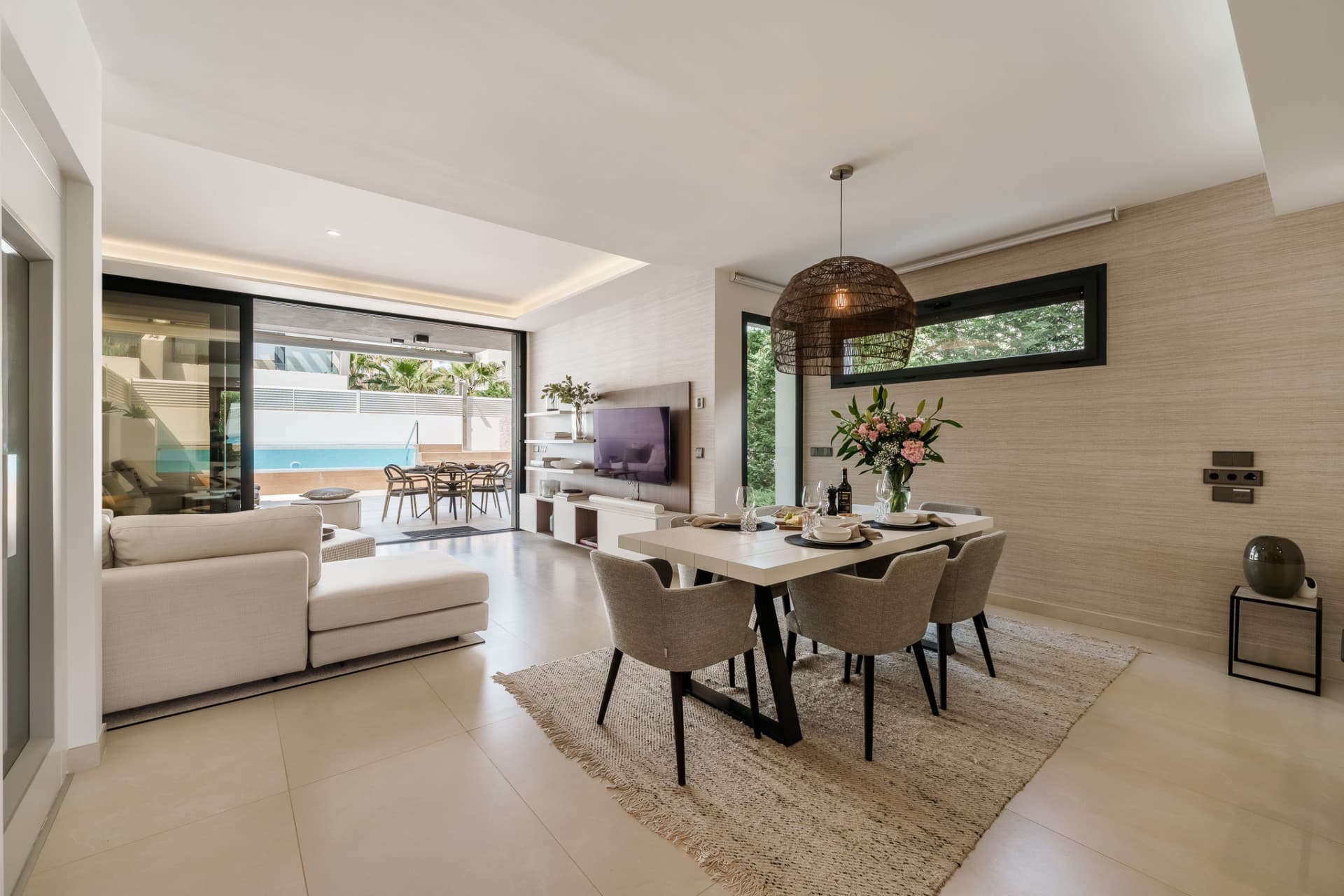 Contemporary Elegance by the Sea in Bahía de Banús This sophisticated, contemporary semi-detached villa is located in Ba