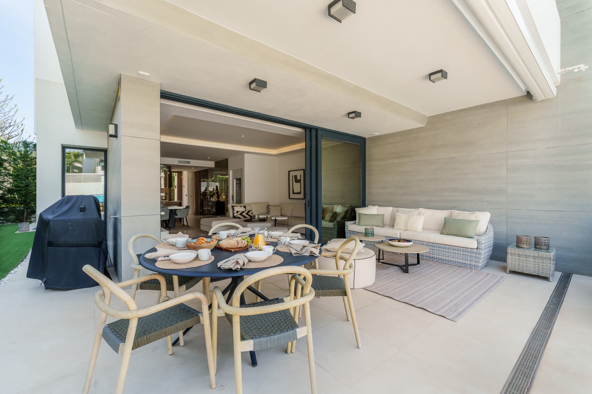 Contemporary Elegance by the Sea in Bahía de Banús This sophisticated, contemporary semi-detached villa is located in Ba