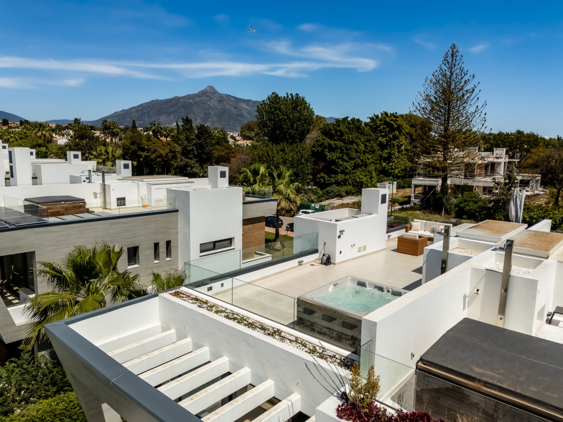 Contemporary Elegance by the Sea in Bahía de Banús This sophisticated, contemporary semi-detached villa is located in Ba