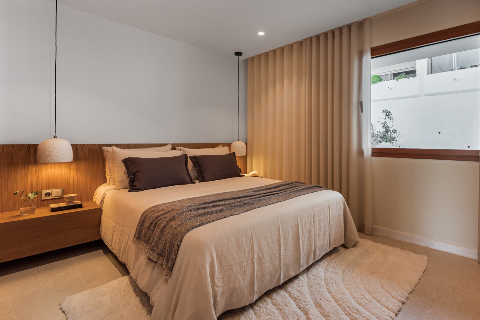 Totally renovated townhouse for sale in Aloha offers four bedrooms and three bathrooms within a peaceful, green resident