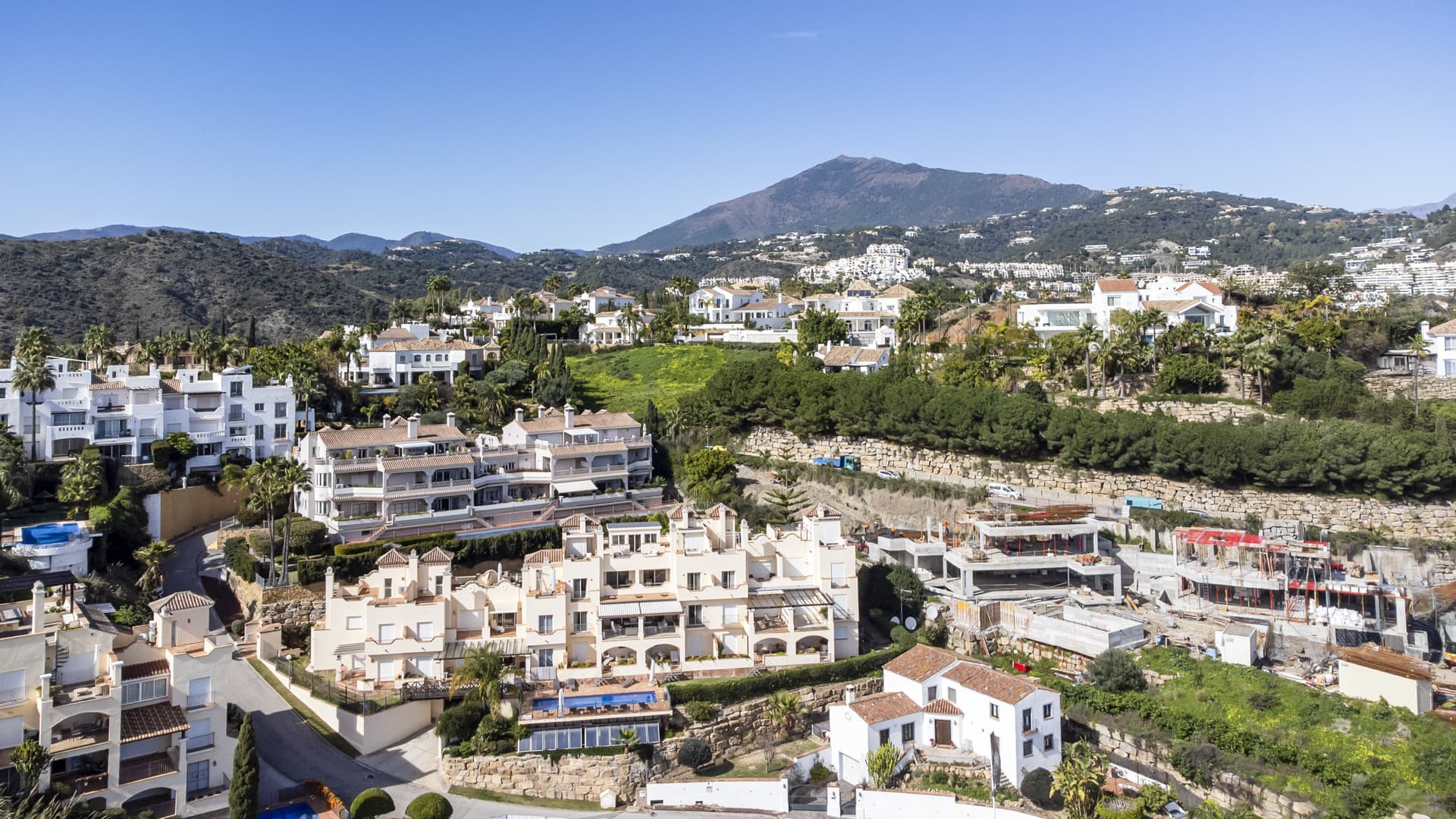 Located in the exclusive and tranquil gated community of Los Almendros, this outstanding south-facing duplex penthouse o