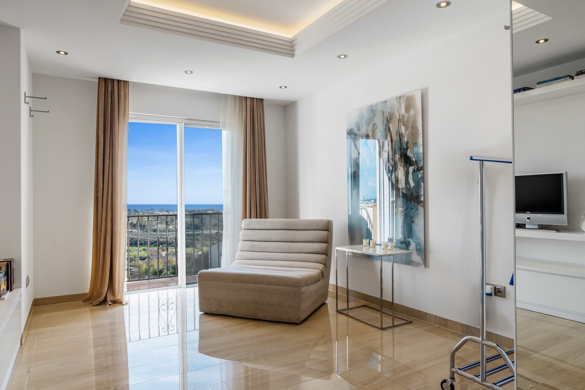 Located in the exclusive and tranquil gated community of Los Almendros, this outstanding south-facing duplex penthouse o
