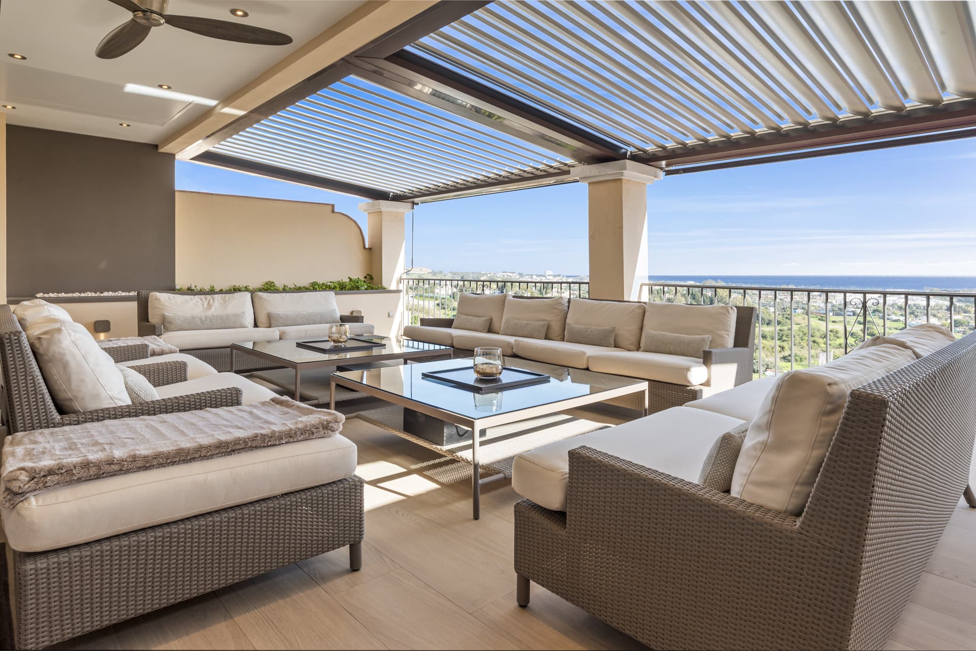 Located in the exclusive and tranquil gated community of Los Almendros, this outstanding south-facing duplex penthouse o