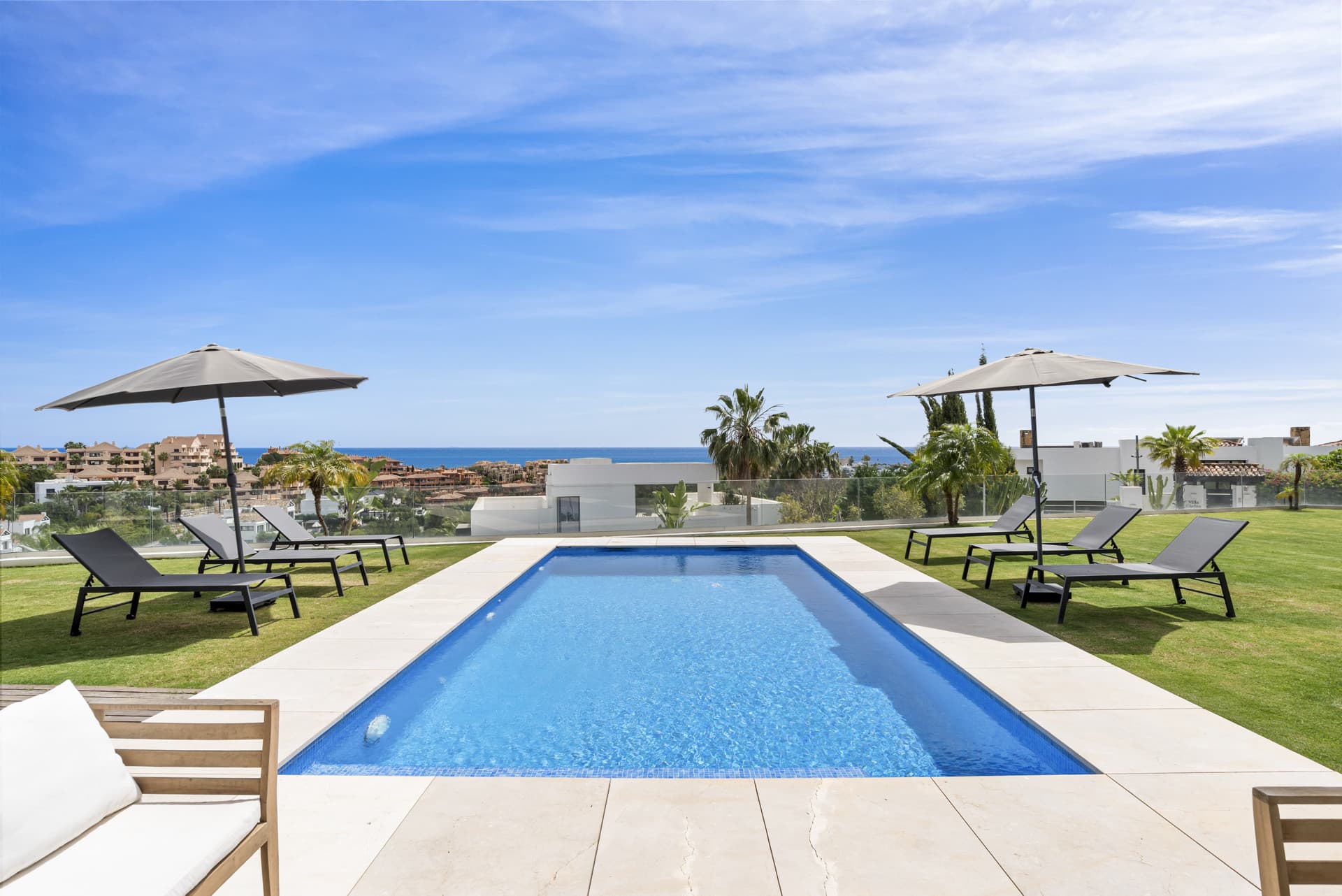 Sophisticated Villa With Panoramic Vistas and Lush Greenery Set in the prestigious enclave of La Alquería in Benahavís,