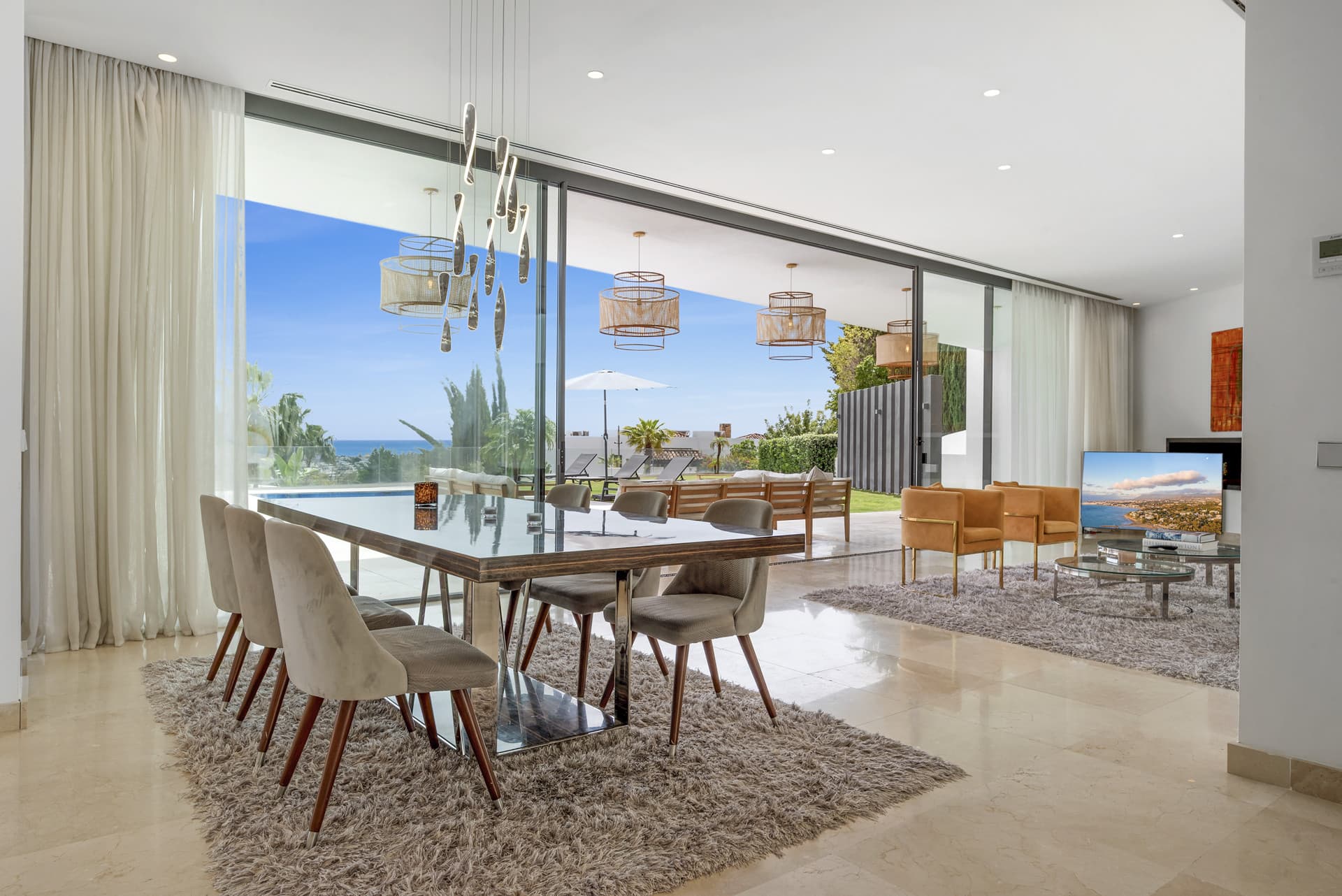 Sophisticated Villa With Panoramic Vistas and Lush Greenery Set in the prestigious enclave of La Alquería in Benahavís,