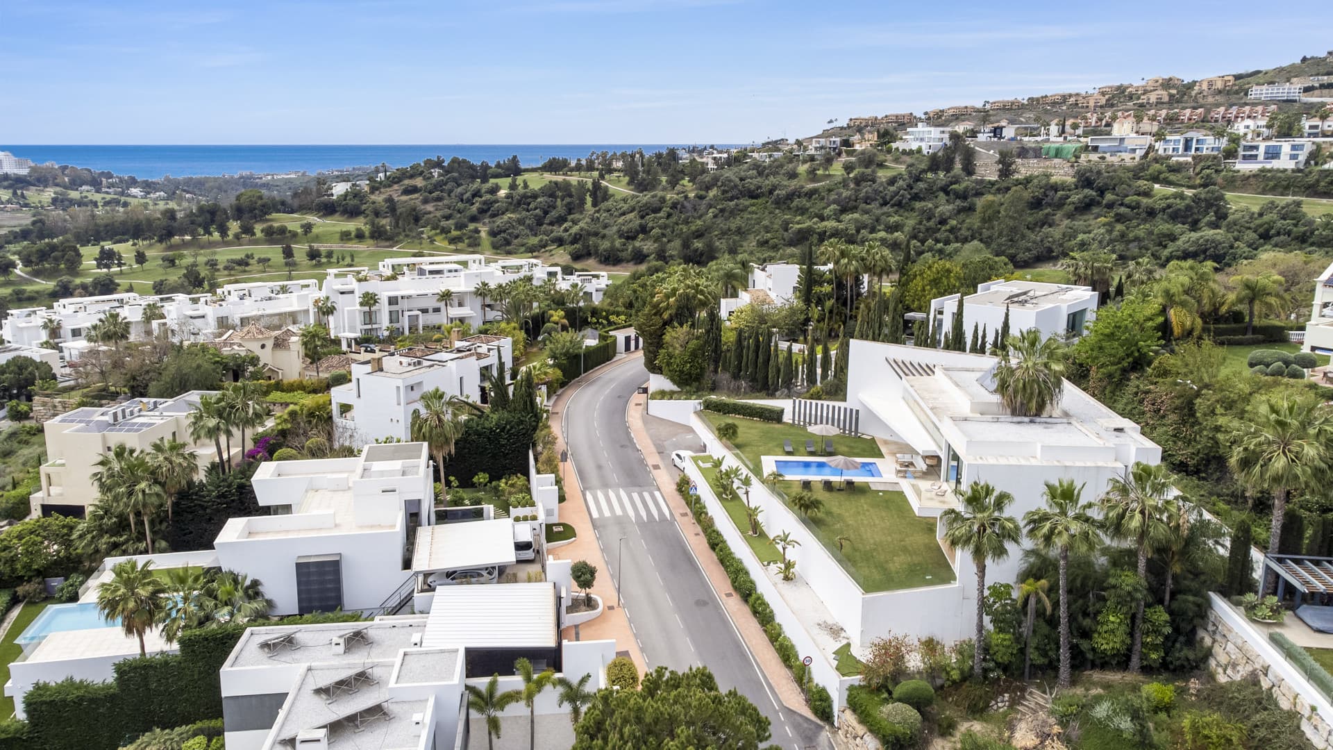 Sophisticated Villa With Panoramic Vistas and Lush Greenery Set in the prestigious enclave of La Alquería in Benahavís,