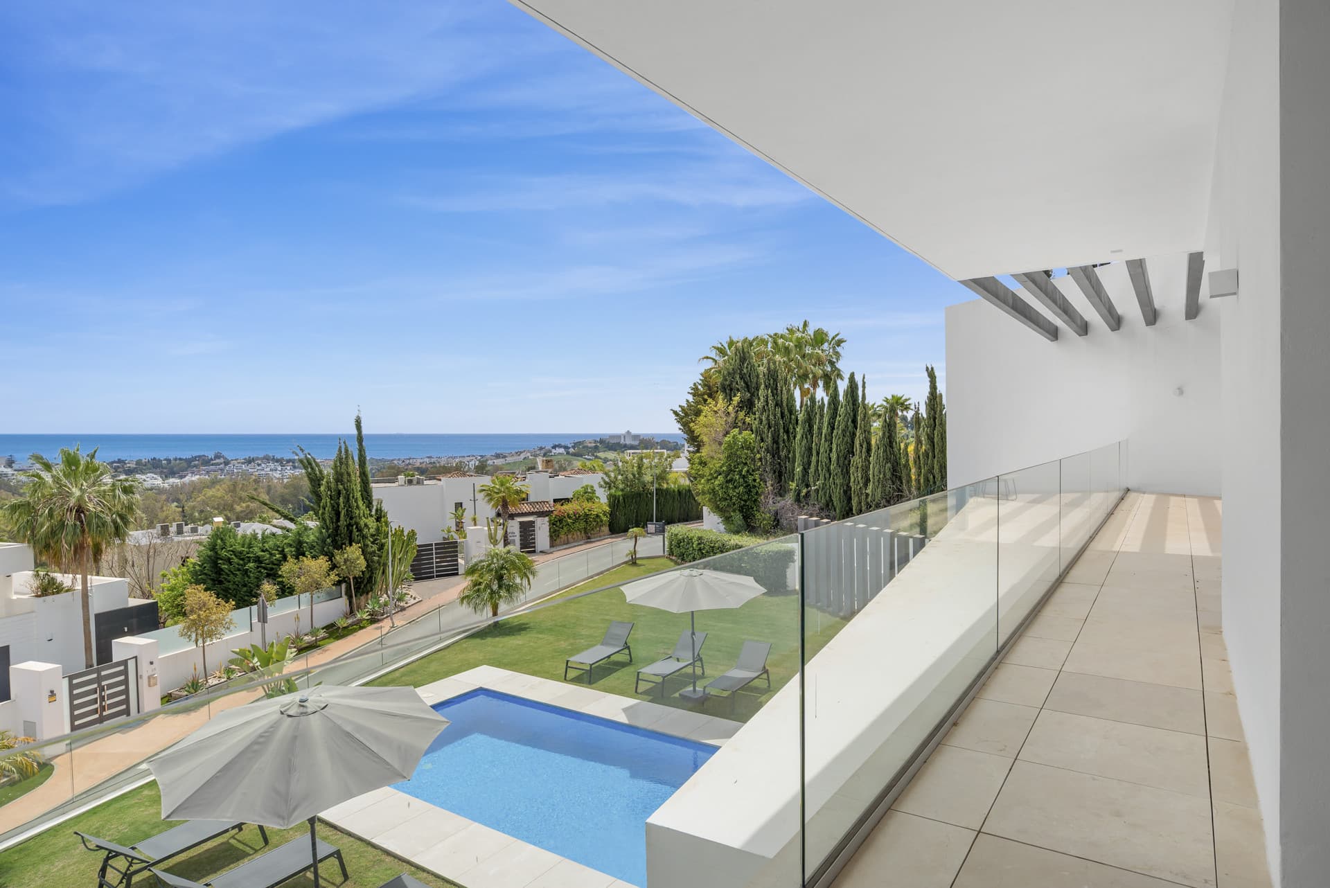 Sophisticated Villa With Panoramic Vistas and Lush Greenery Set in the prestigious enclave of La Alquería in Benahavís,