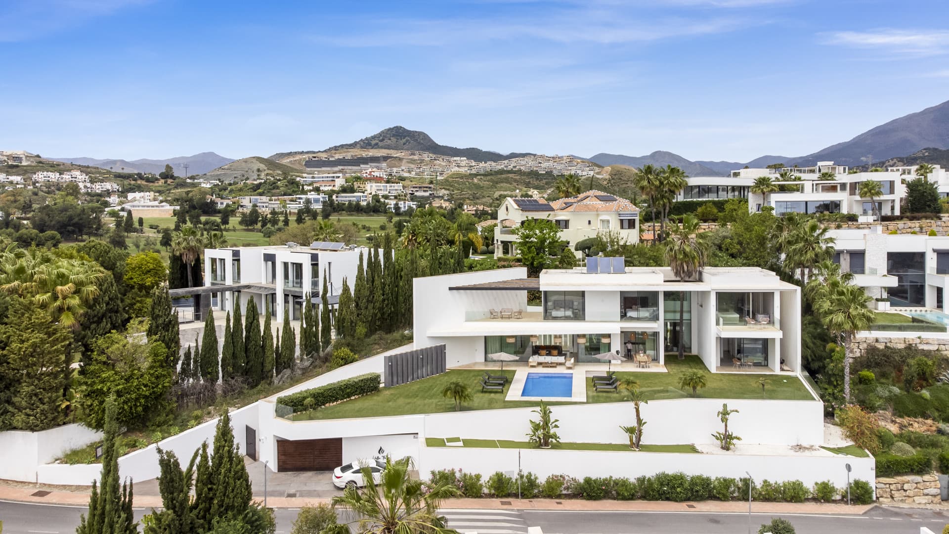 Sophisticated Villa With Panoramic Vistas and Lush Greenery Set in the prestigious enclave of La Alquería in Benahavís,