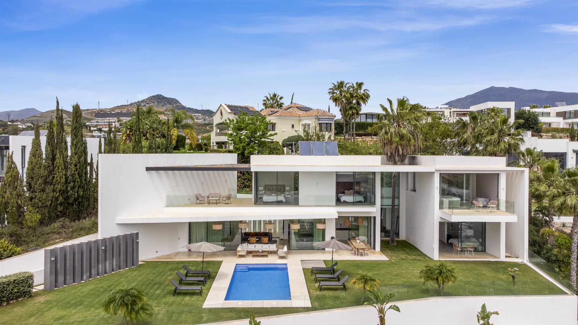 Sophisticated Villa With Panoramic Vistas and Lush Greenery Set in the prestigious enclave of La Alquería in Benahavís,