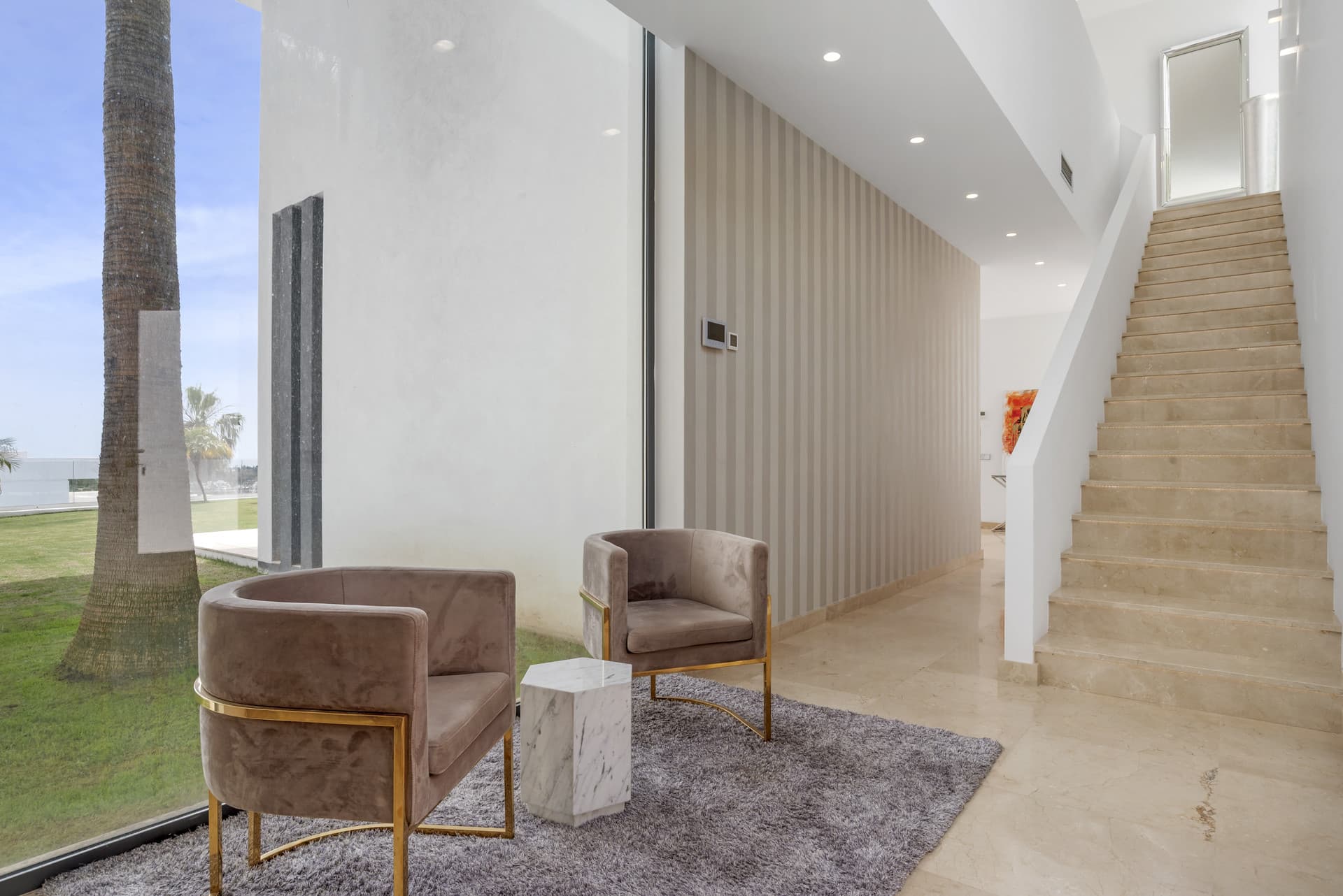 Sophisticated Villa With Panoramic Vistas and Lush Greenery Set in the prestigious enclave of La Alquería in Benahavís,