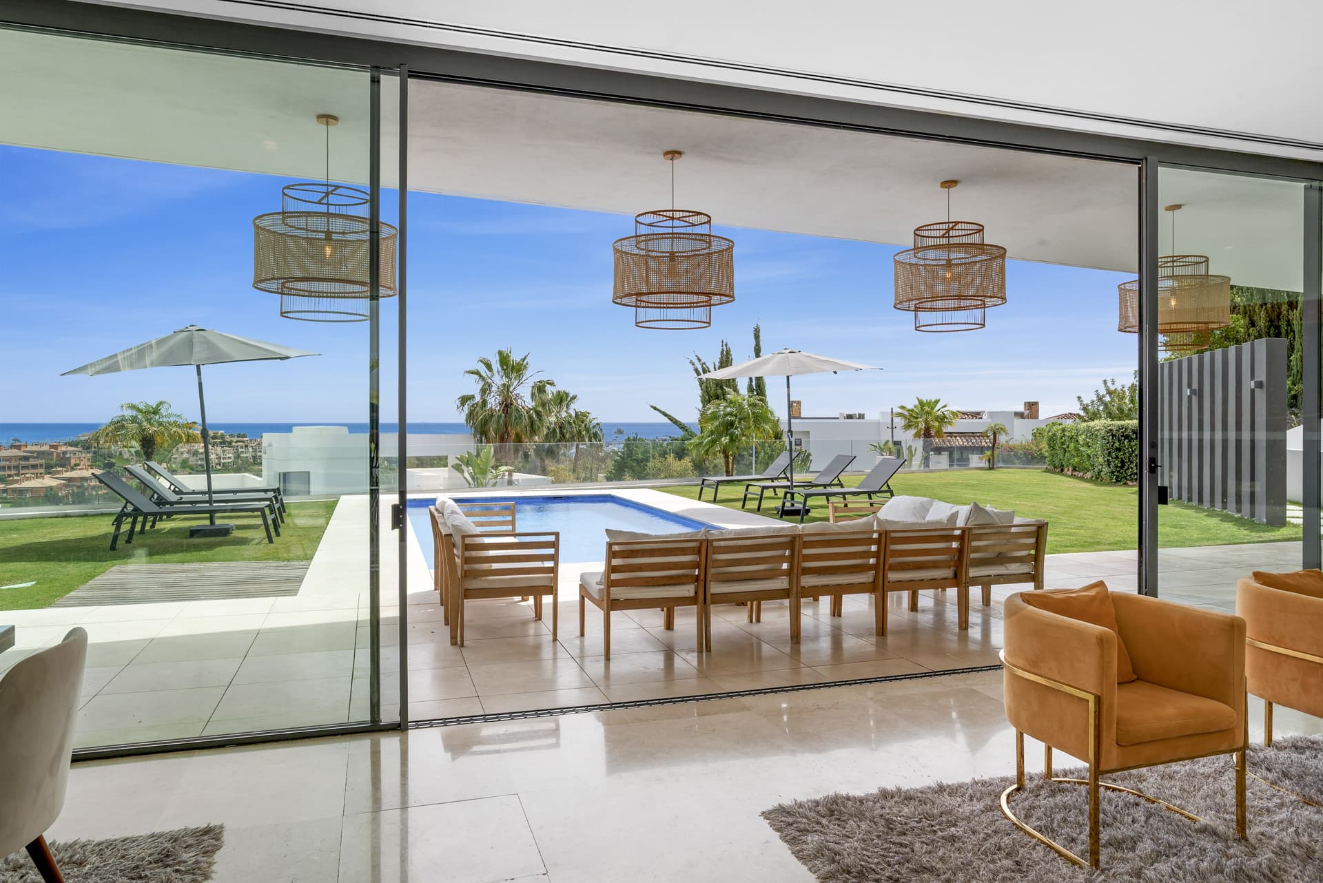 Sophisticated Villa With Panoramic Vistas and Lush Greenery Set in the prestigious enclave of La Alquería in Benahavís,