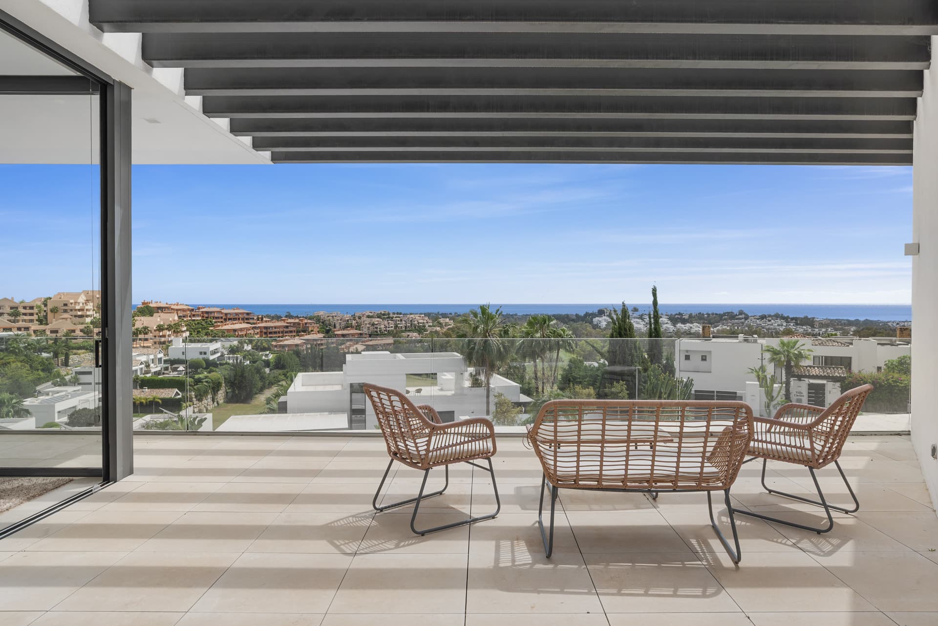 Sophisticated Villa With Panoramic Vistas and Lush Greenery Set in the prestigious enclave of La Alquería in Benahavís,