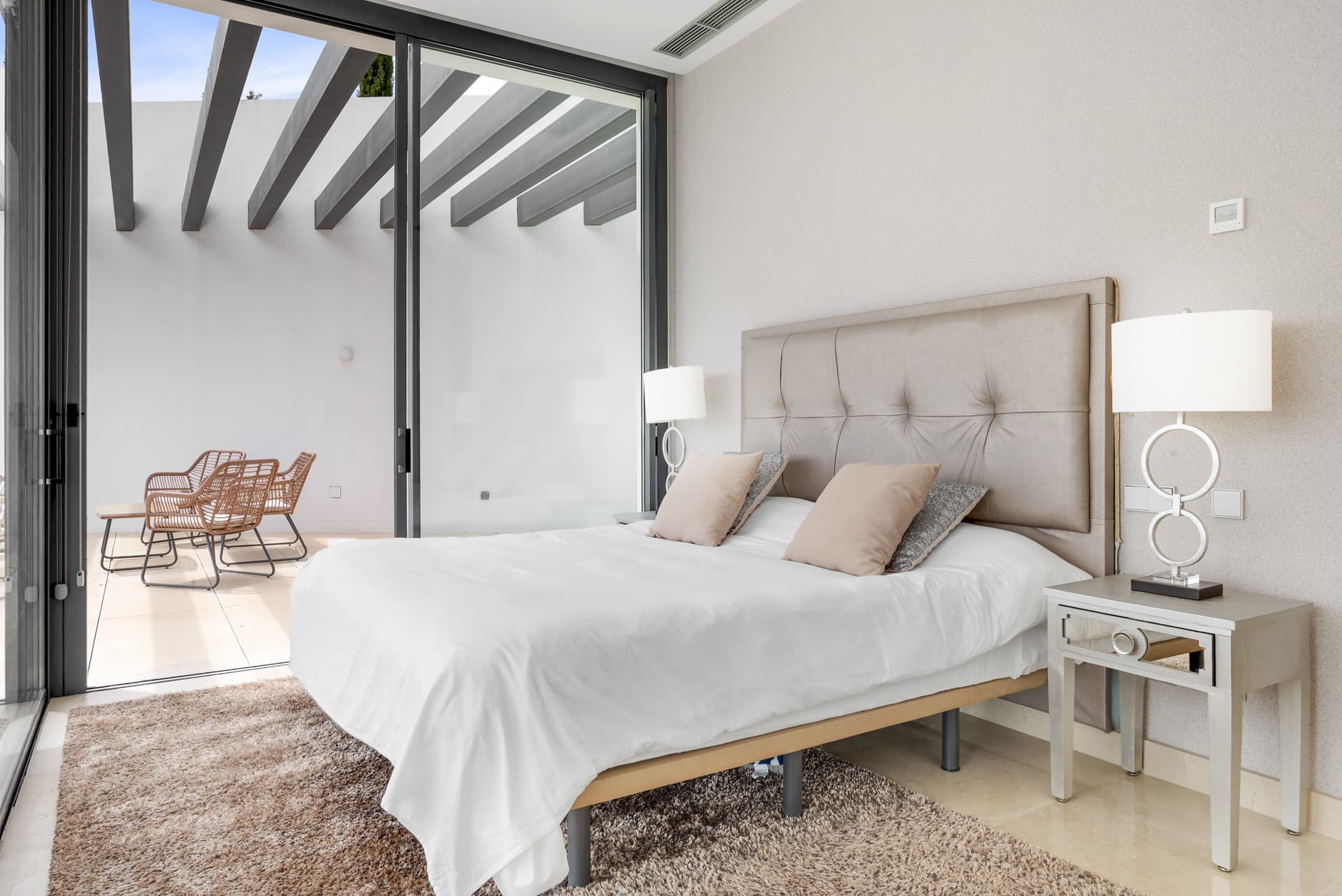 Sophisticated Villa With Panoramic Vistas and Lush Greenery Set in the prestigious enclave of La Alquería in Benahavís,